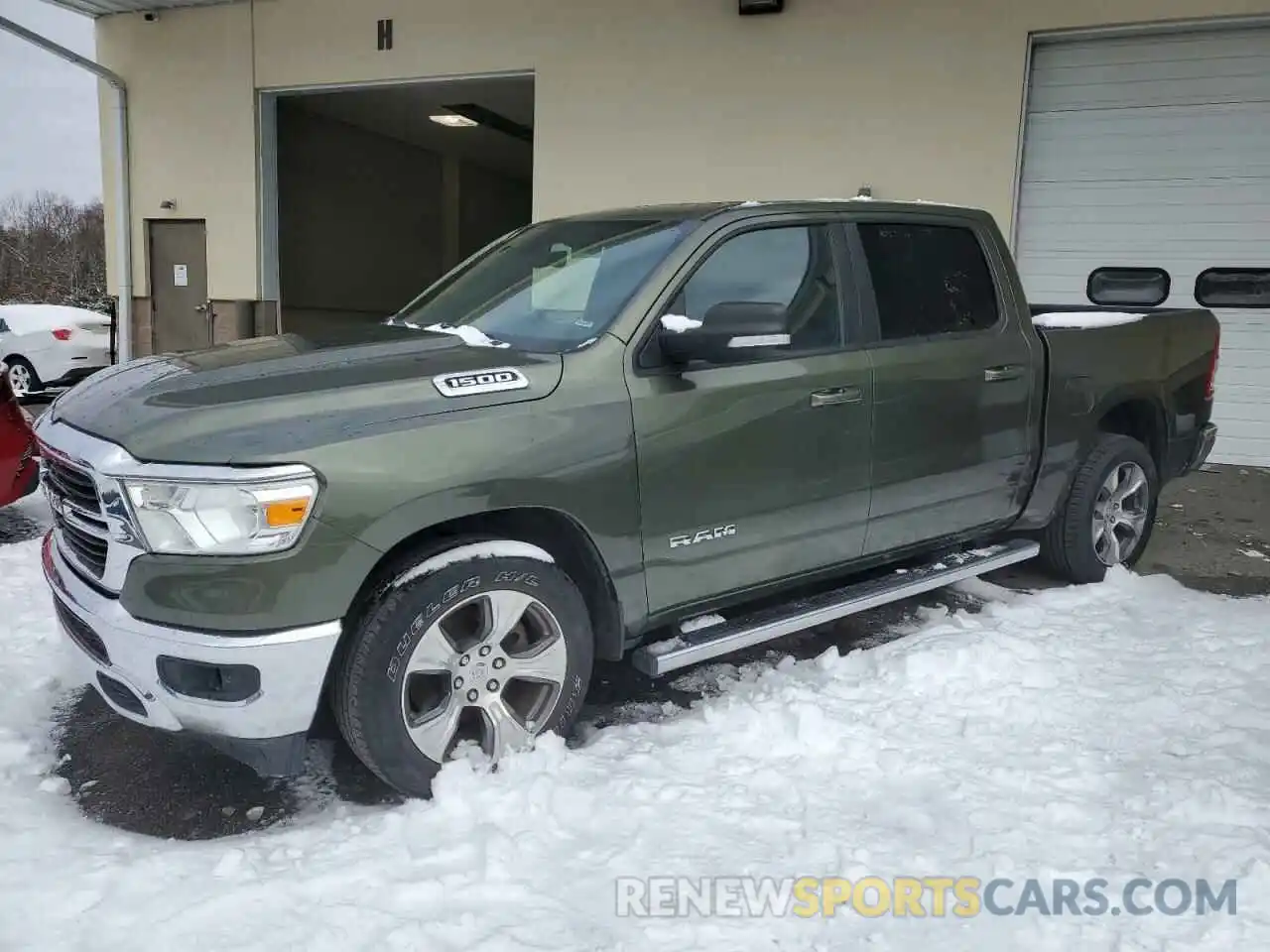 1 Photograph of a damaged car 1C6RREFG9MN543345 RAM 1500 2021