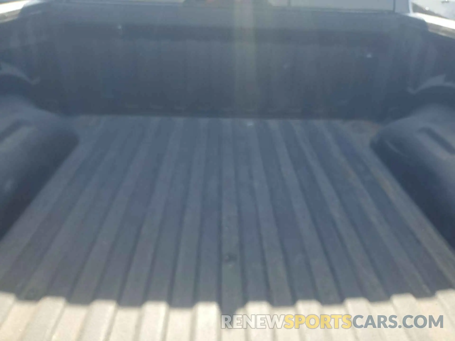 14 Photograph of a damaged car 1C6RREFM2MN743683 RAM 1500 2021