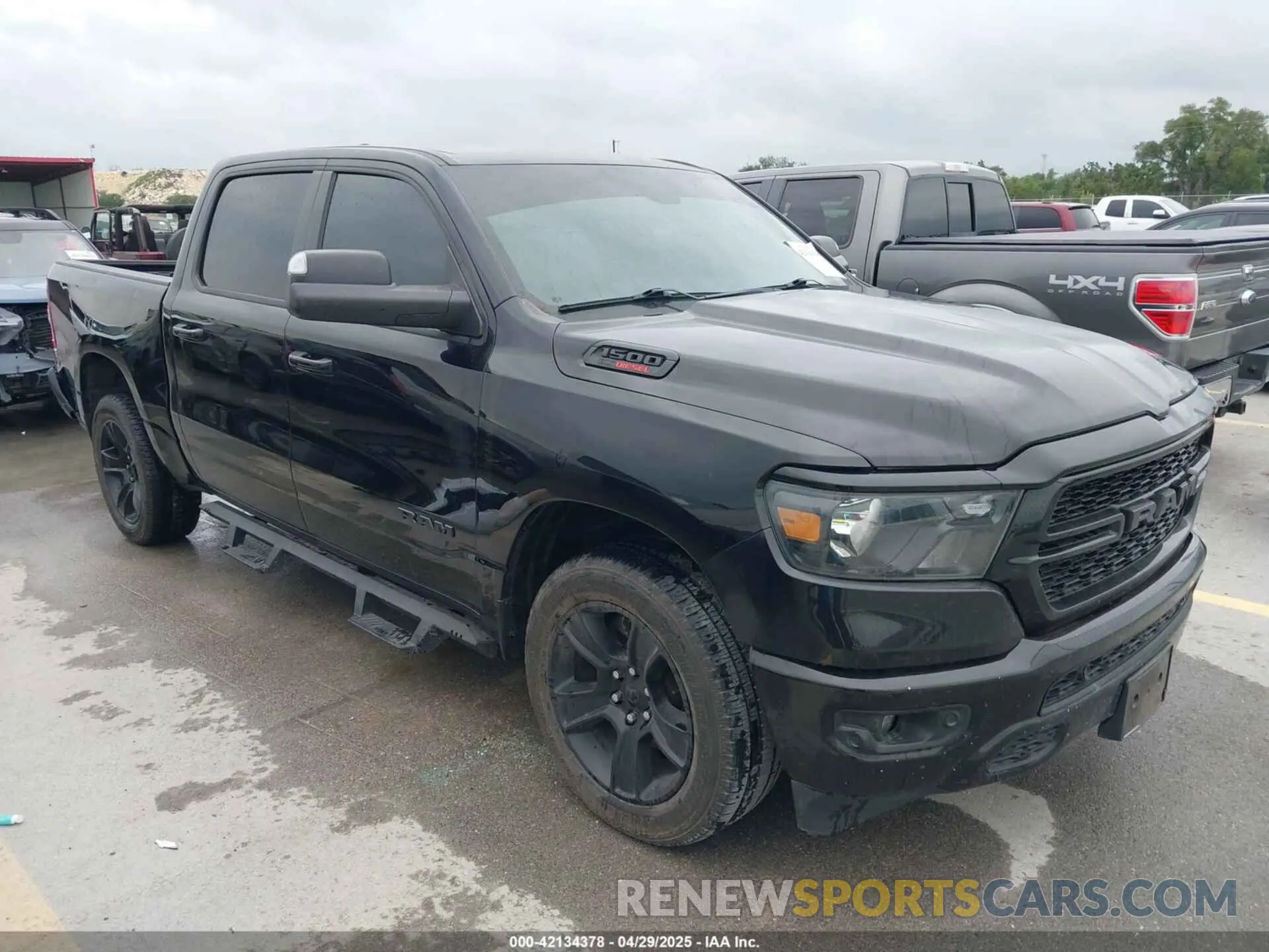 1 Photograph of a damaged car 1C6RREFM3MN835868 RAM 1500 2021