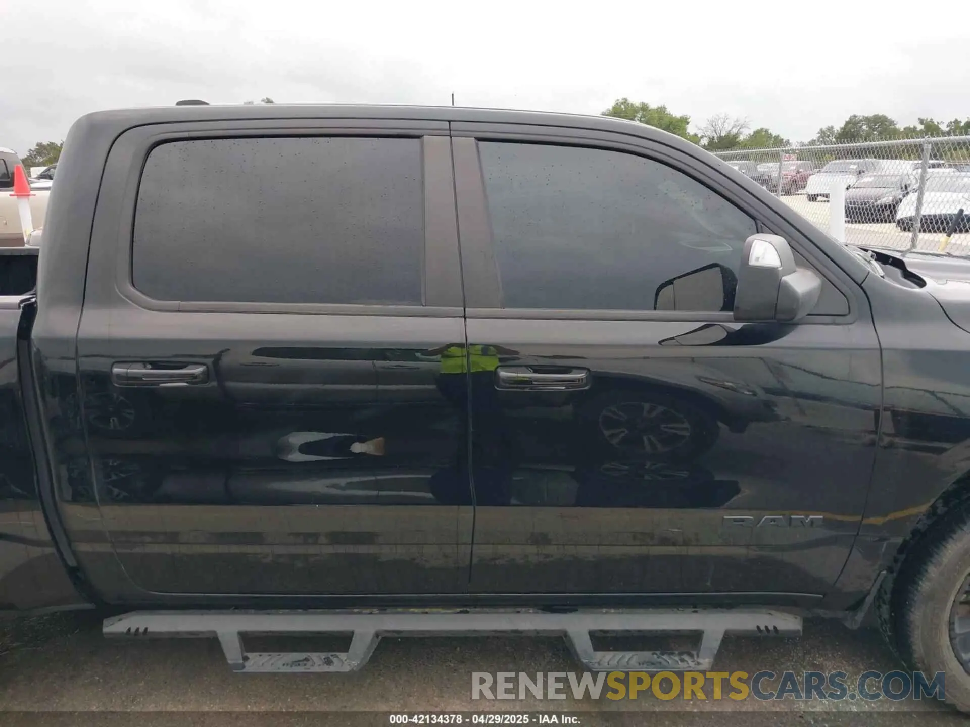 13 Photograph of a damaged car 1C6RREFM3MN835868 RAM 1500 2021