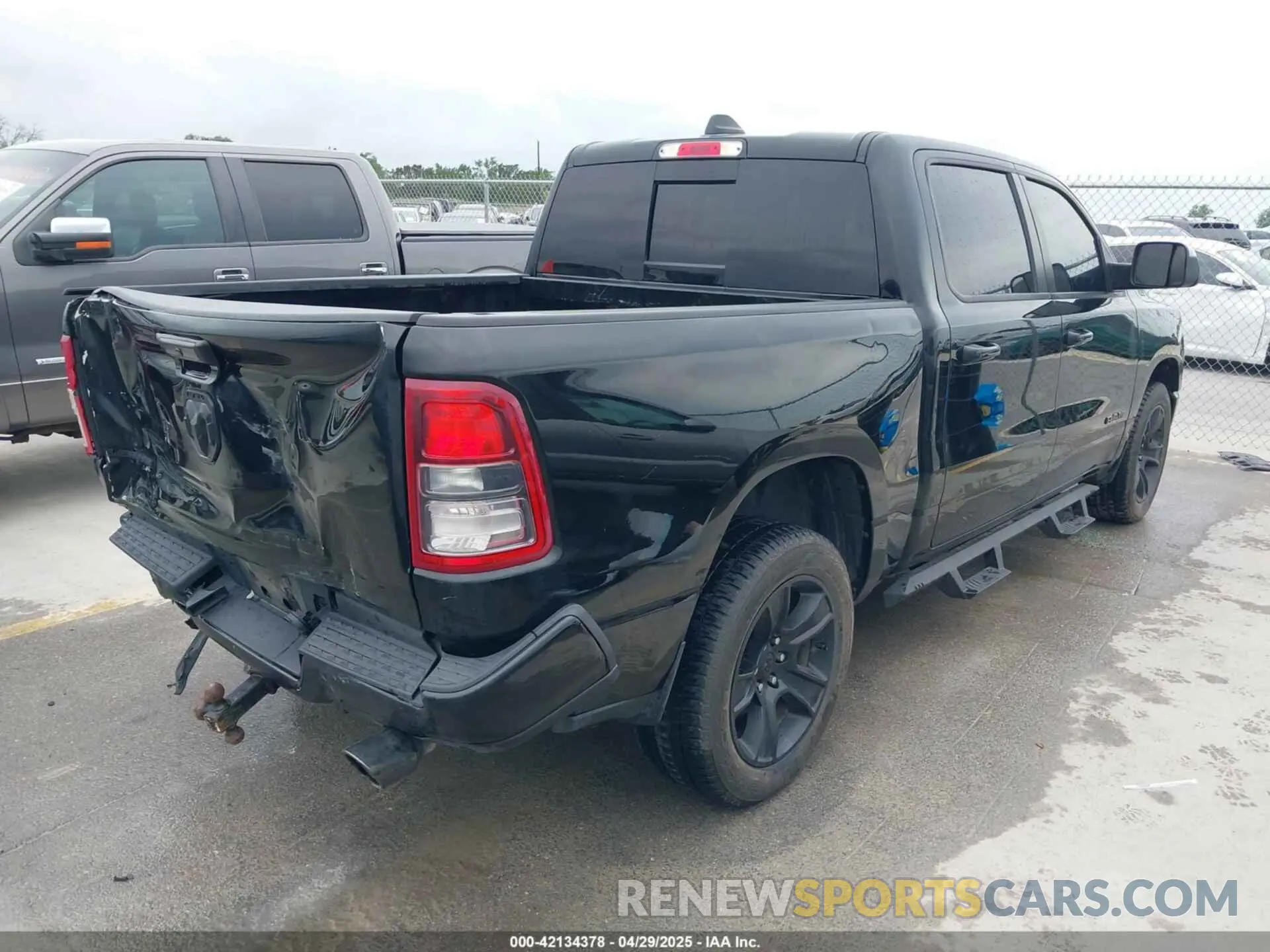 4 Photograph of a damaged car 1C6RREFM3MN835868 RAM 1500 2021
