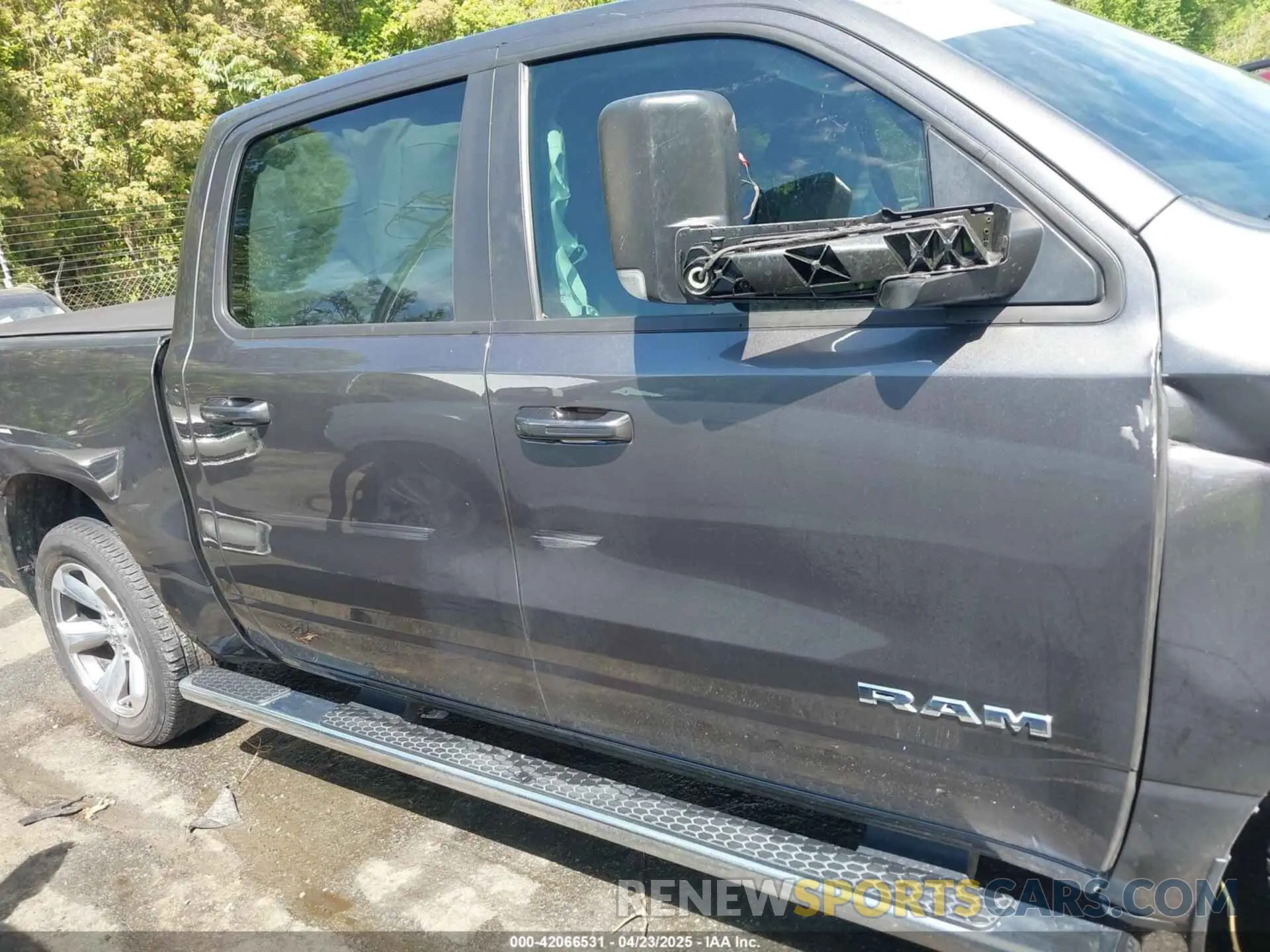 12 Photograph of a damaged car 1C6RREFM5MN813578 RAM 1500 2021