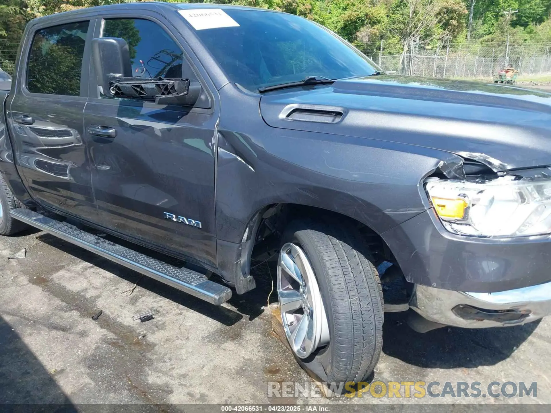 16 Photograph of a damaged car 1C6RREFM5MN813578 RAM 1500 2021