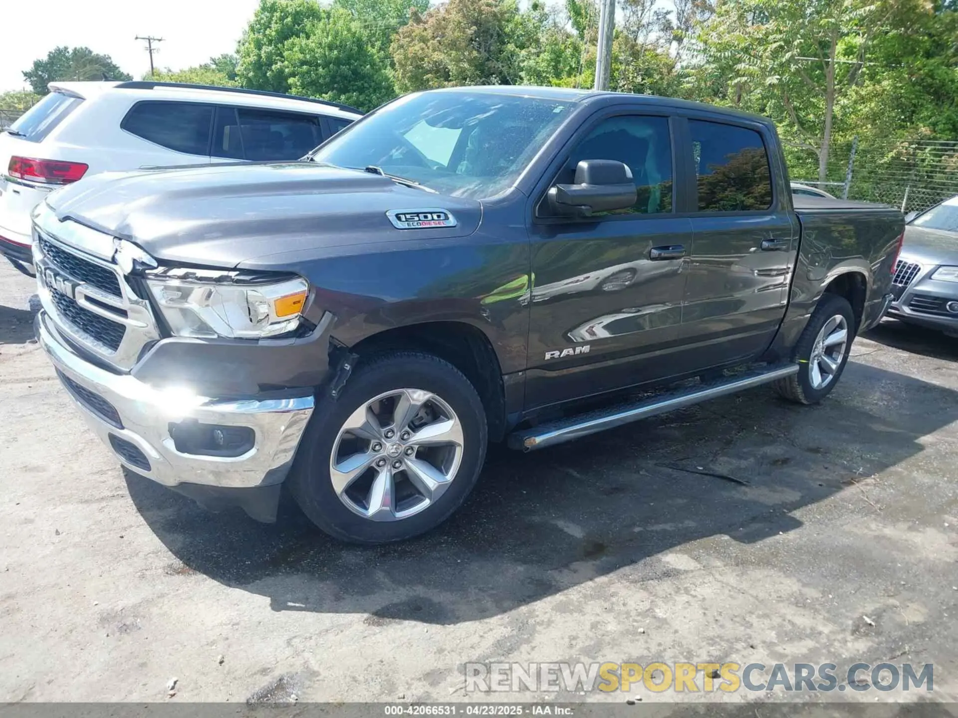 2 Photograph of a damaged car 1C6RREFM5MN813578 RAM 1500 2021