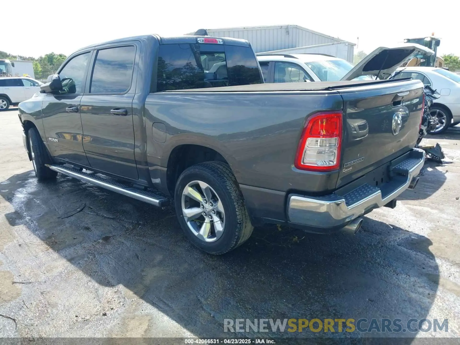 3 Photograph of a damaged car 1C6RREFM5MN813578 RAM 1500 2021