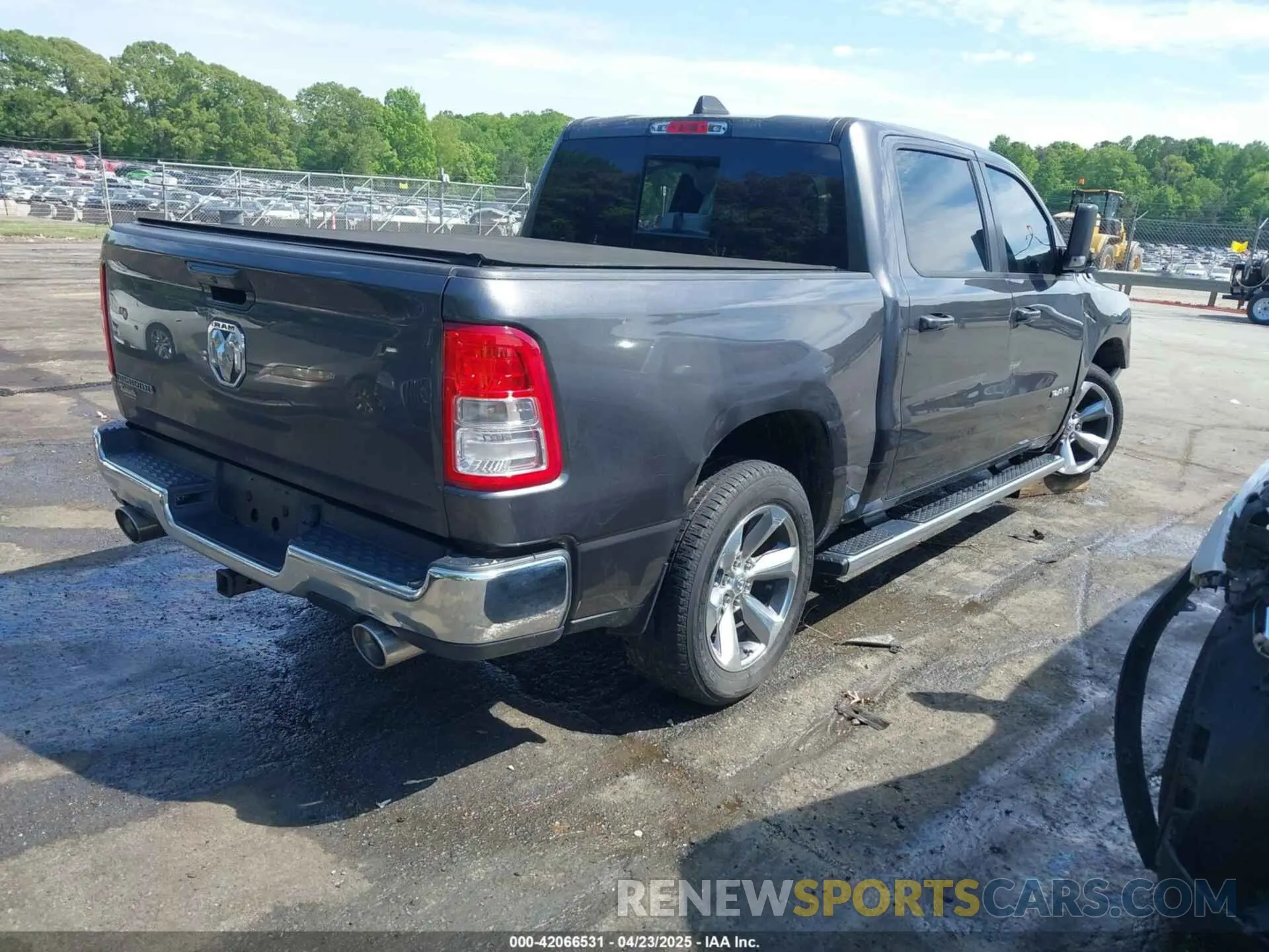 4 Photograph of a damaged car 1C6RREFM5MN813578 RAM 1500 2021