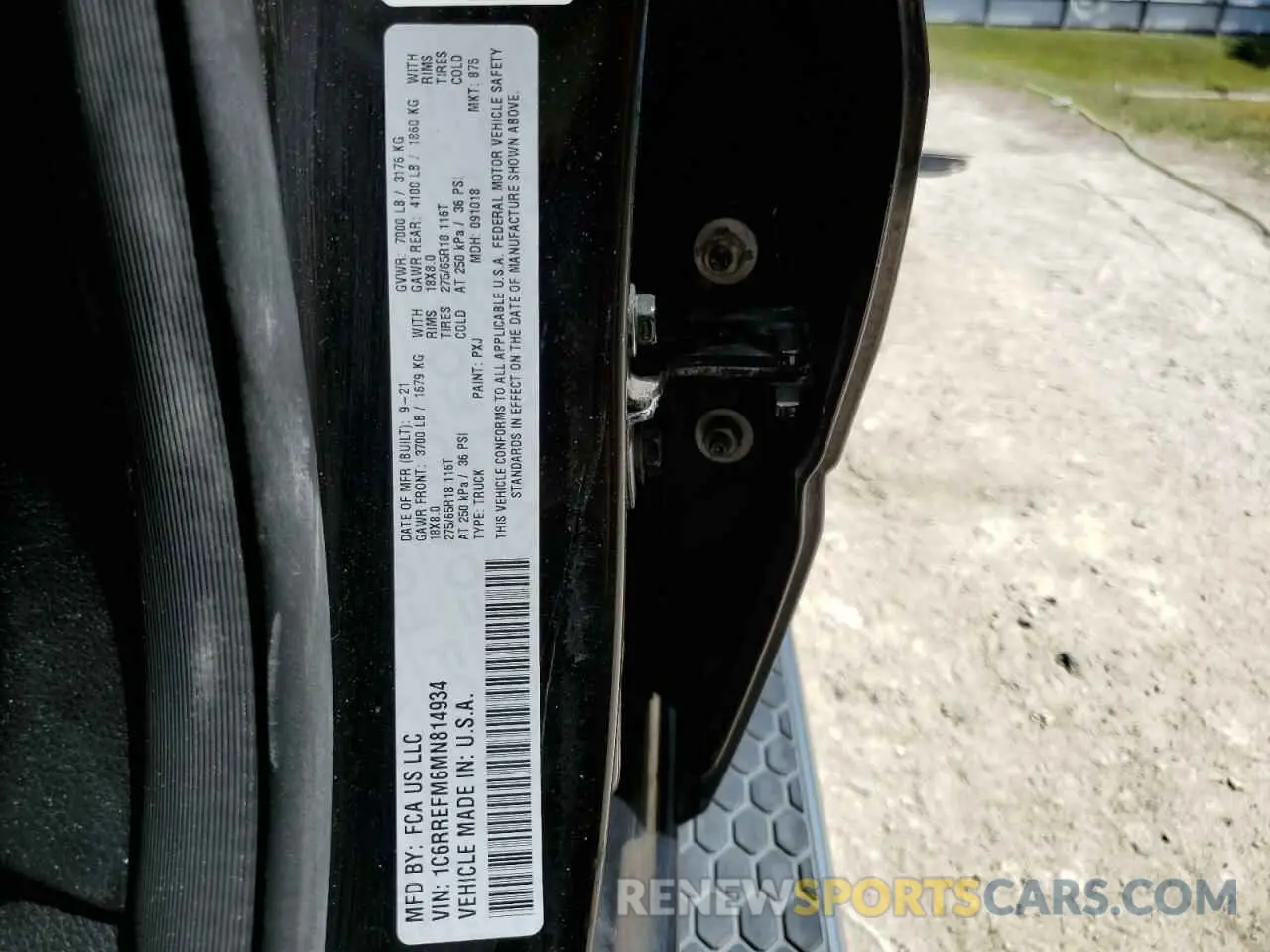 13 Photograph of a damaged car 1C6RREFM6MN814934 RAM 1500 2021