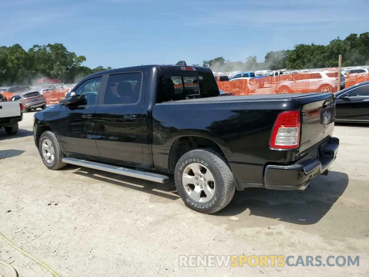 2 Photograph of a damaged car 1C6RREFM6MN814934 RAM 1500 2021