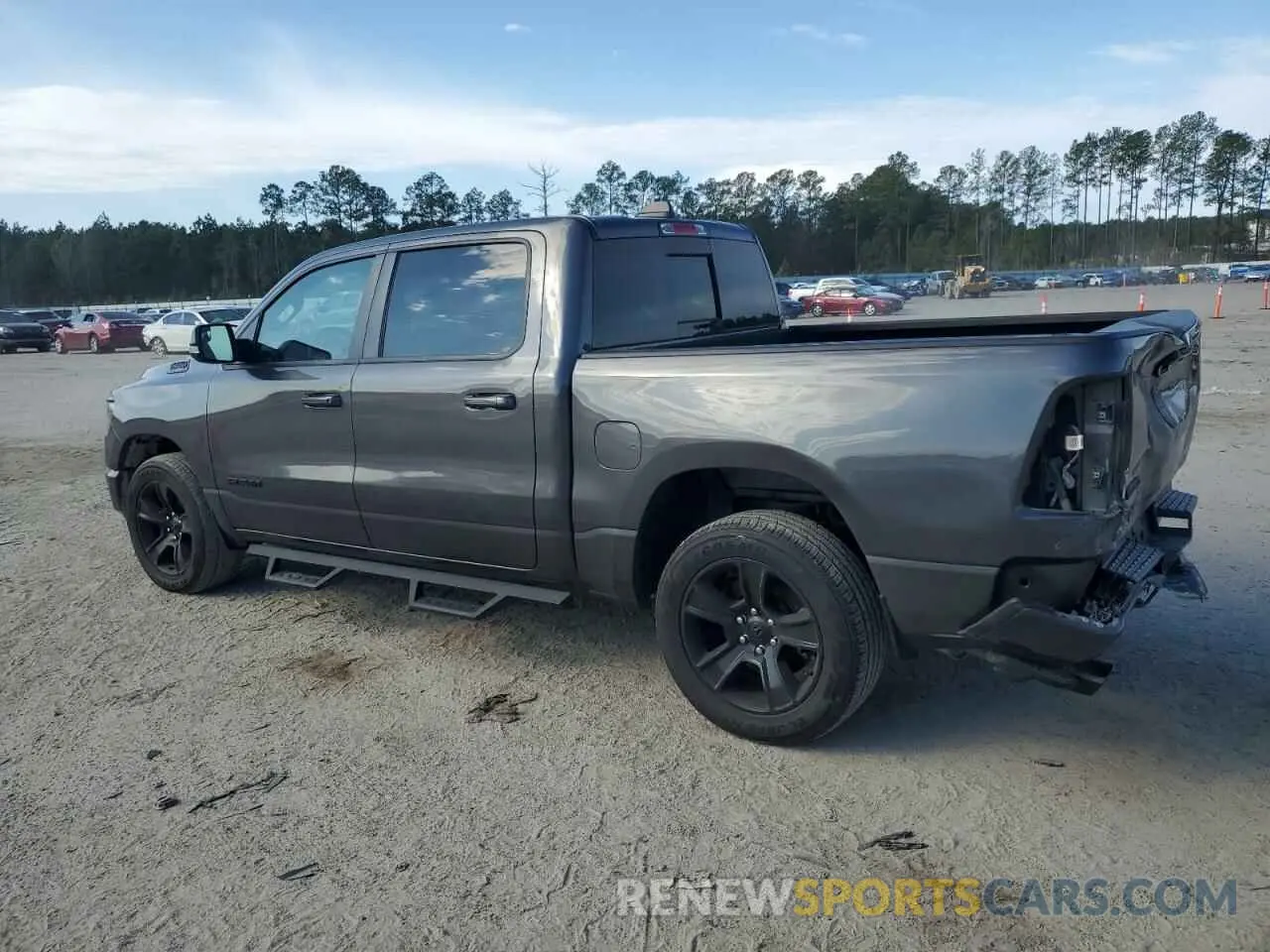 2 Photograph of a damaged car 1C6RREFM6MN834438 RAM 1500 2021