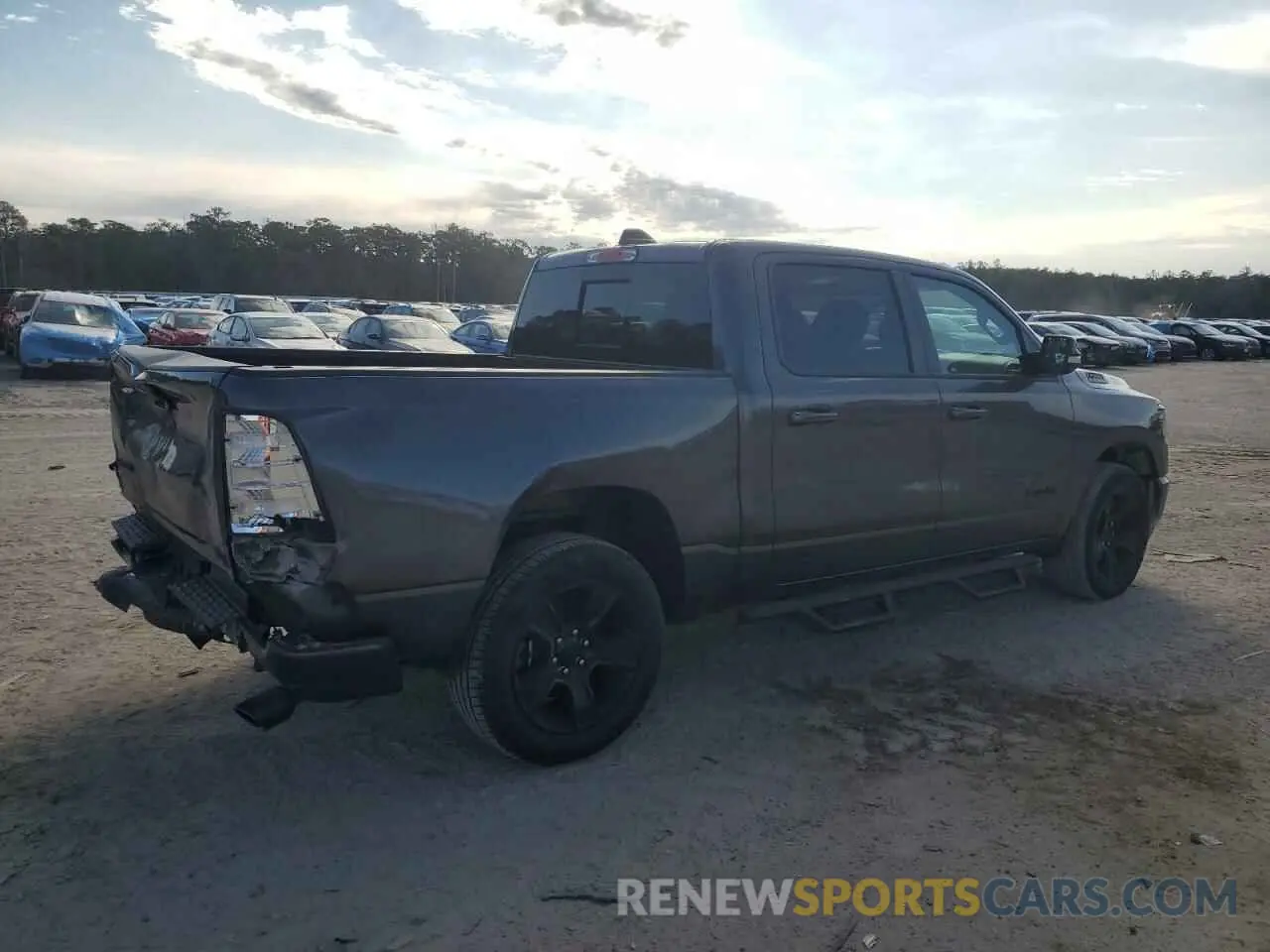 3 Photograph of a damaged car 1C6RREFM6MN834438 RAM 1500 2021