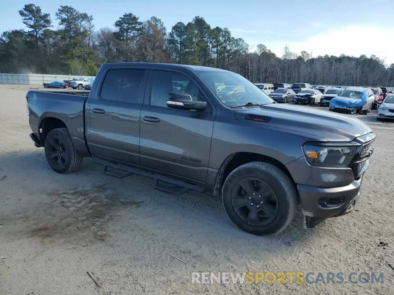4 Photograph of a damaged car 1C6RREFM6MN834438 RAM 1500 2021