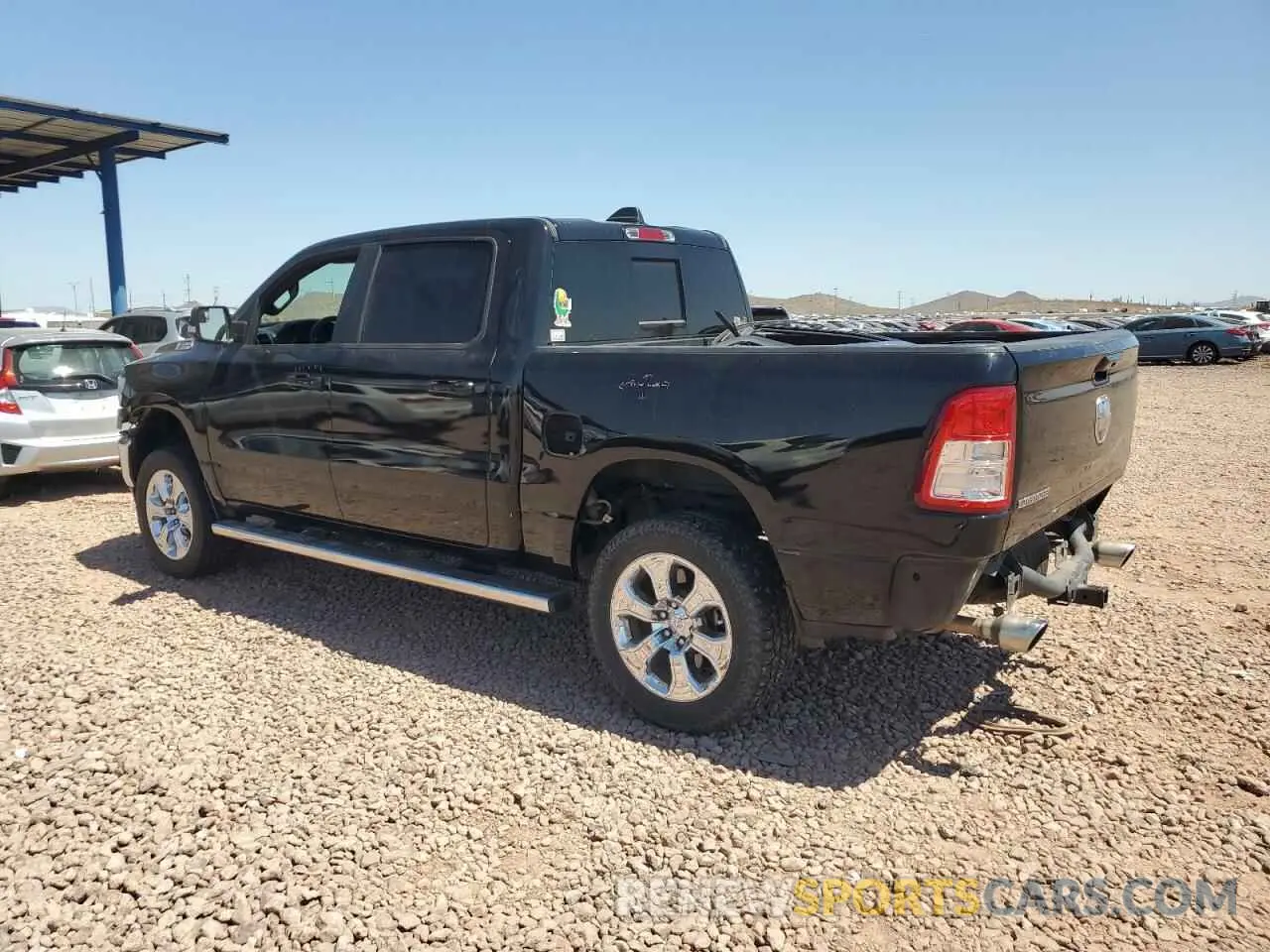 2 Photograph of a damaged car 1C6RREFM7MN712008 RAM 1500 2021