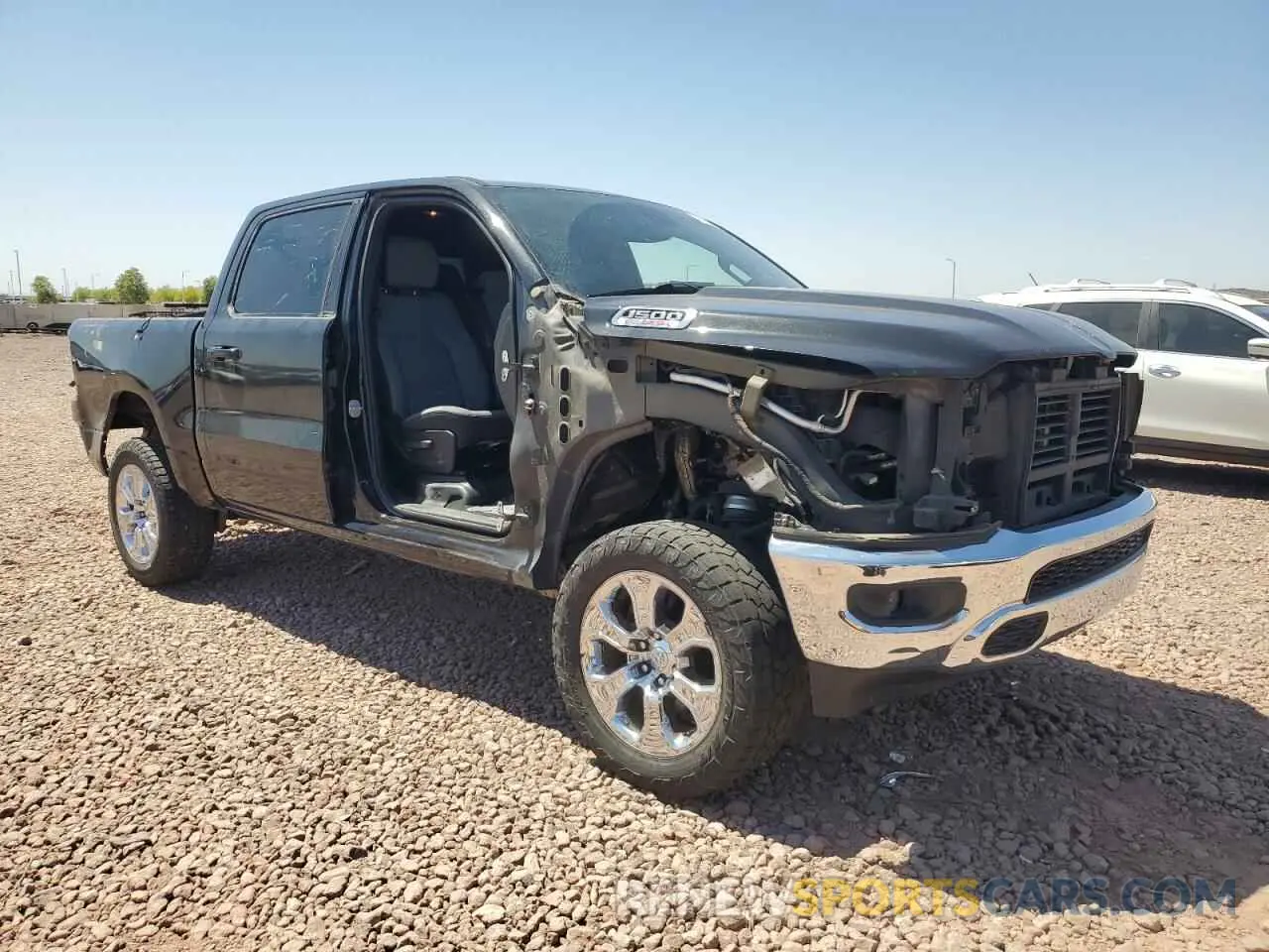 4 Photograph of a damaged car 1C6RREFM7MN712008 RAM 1500 2021