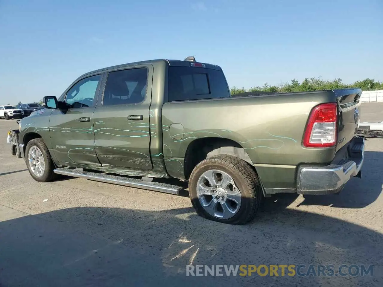 2 Photograph of a damaged car 1C6RREFM8MN630286 RAM 1500 2021
