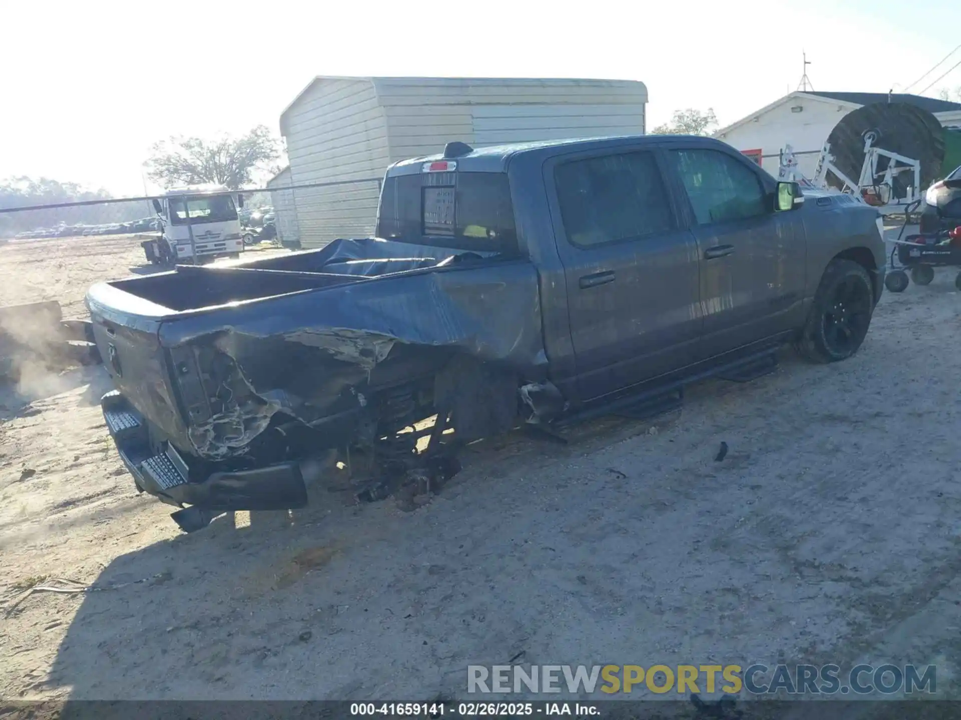 4 Photograph of a damaged car 1C6RREFT0MN629169 RAM 1500 2021