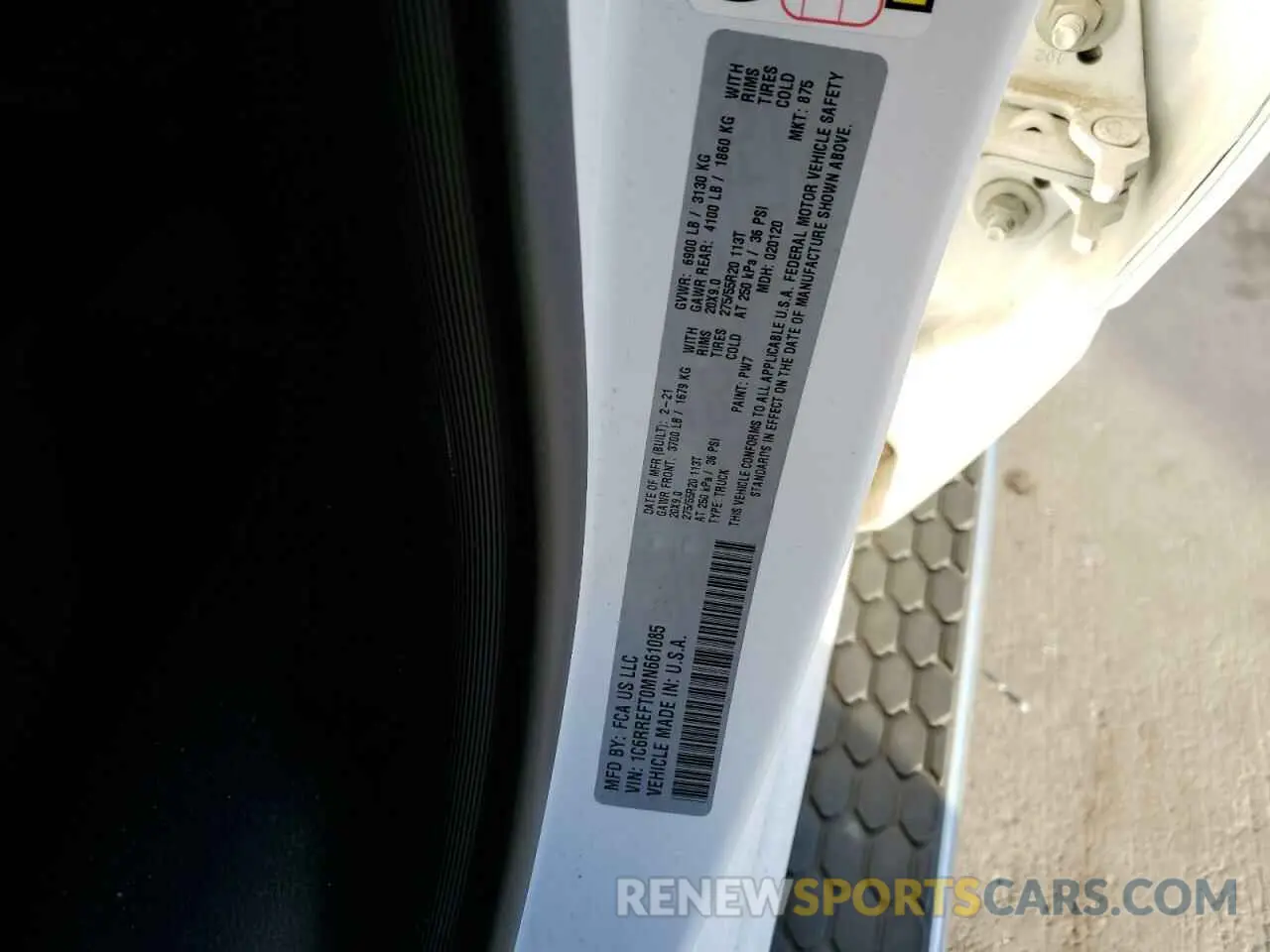 12 Photograph of a damaged car 1C6RREFT0MN661085 RAM 1500 2021