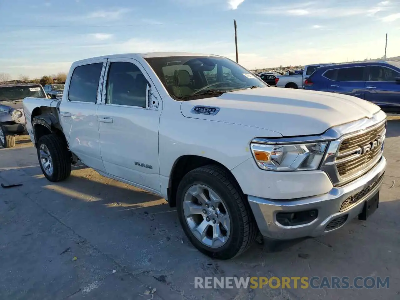 4 Photograph of a damaged car 1C6RREFT0MN661085 RAM 1500 2021