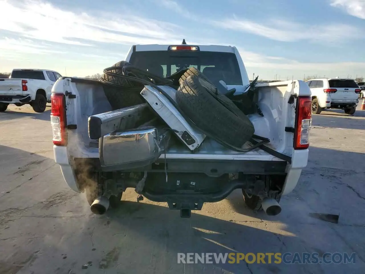 6 Photograph of a damaged car 1C6RREFT0MN661085 RAM 1500 2021