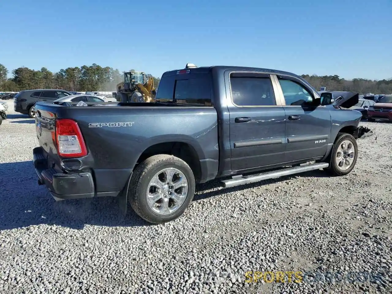 3 Photograph of a damaged car 1C6RREFT1MN543014 RAM 1500 2021