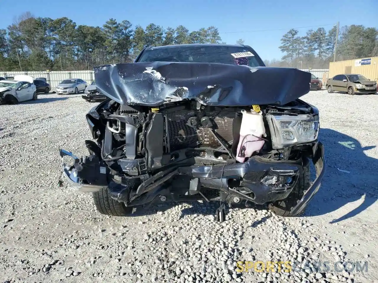 5 Photograph of a damaged car 1C6RREFT1MN543014 RAM 1500 2021