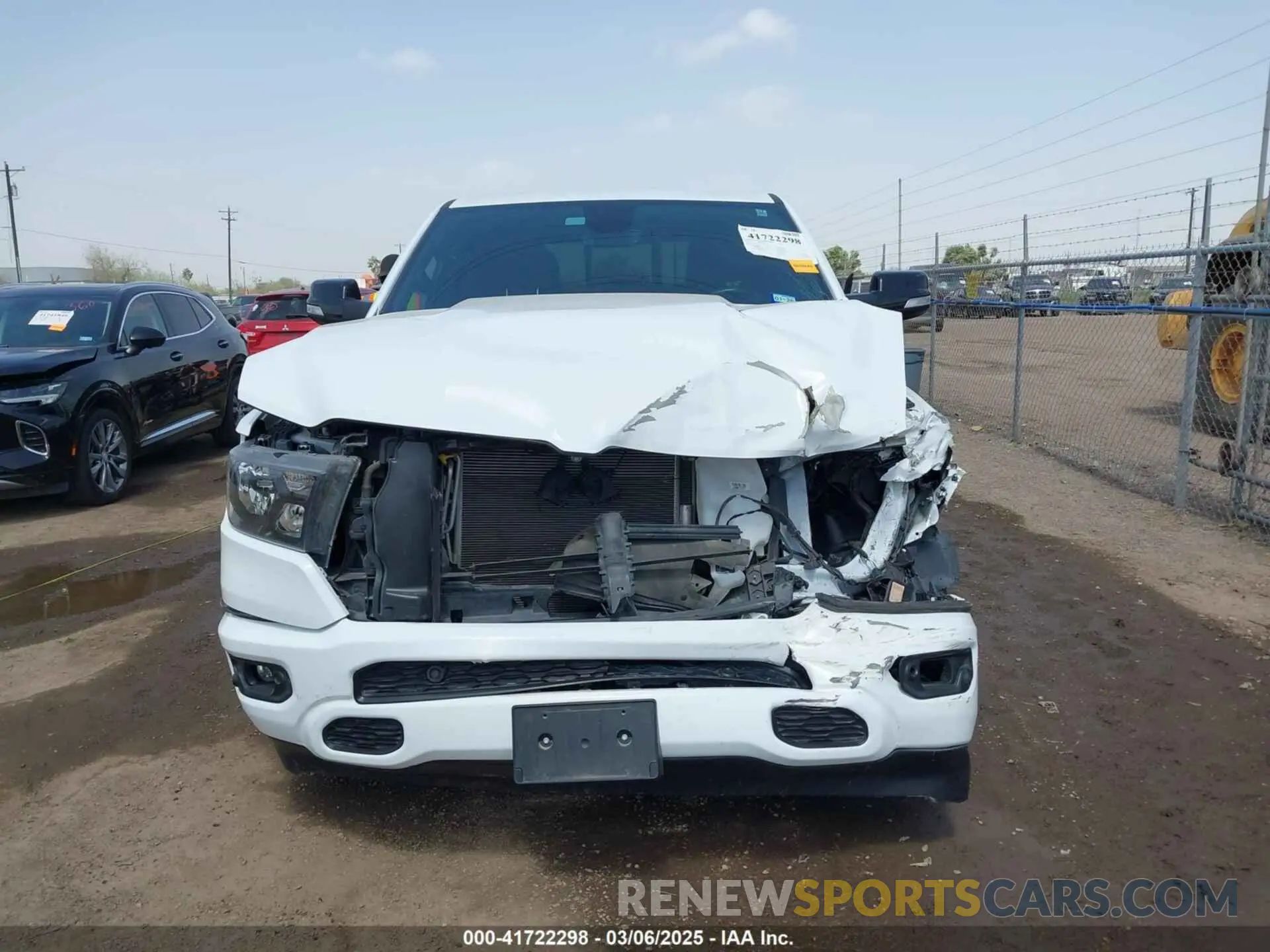 12 Photograph of a damaged car 1C6RREFT1MN592746 RAM 1500 2021
