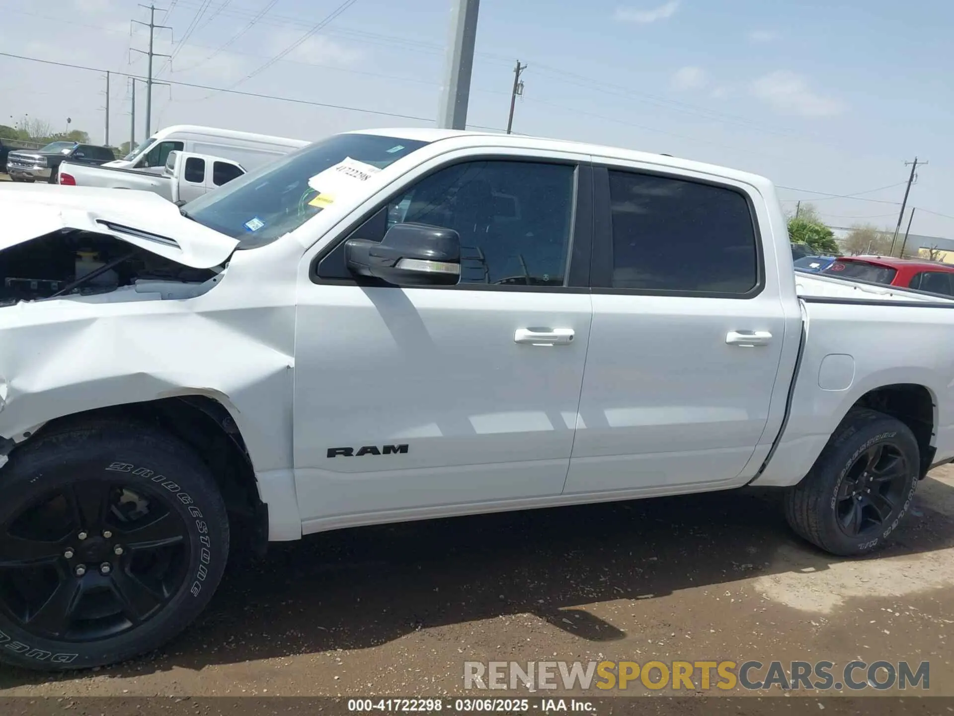 14 Photograph of a damaged car 1C6RREFT1MN592746 RAM 1500 2021