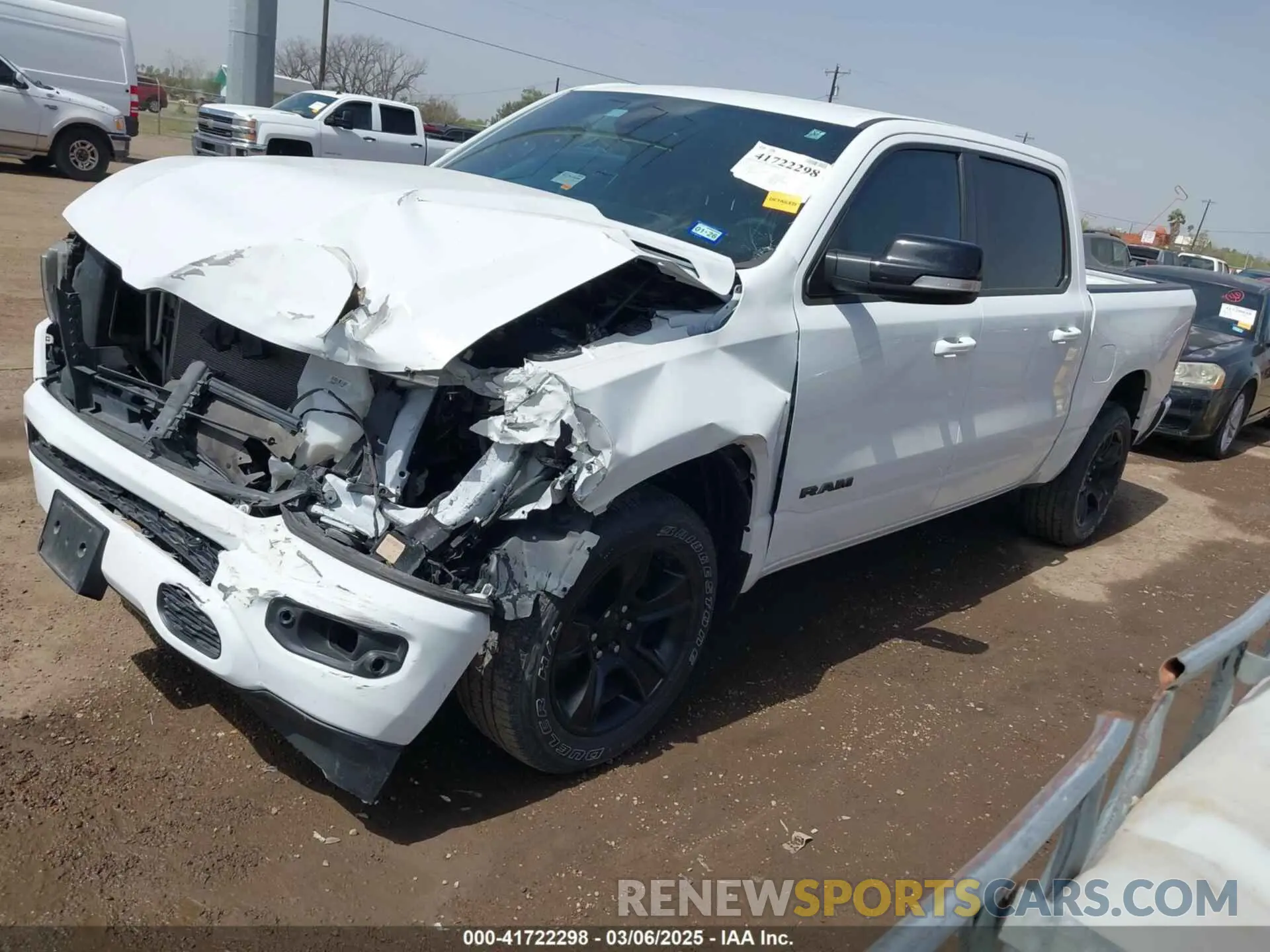 2 Photograph of a damaged car 1C6RREFT1MN592746 RAM 1500 2021