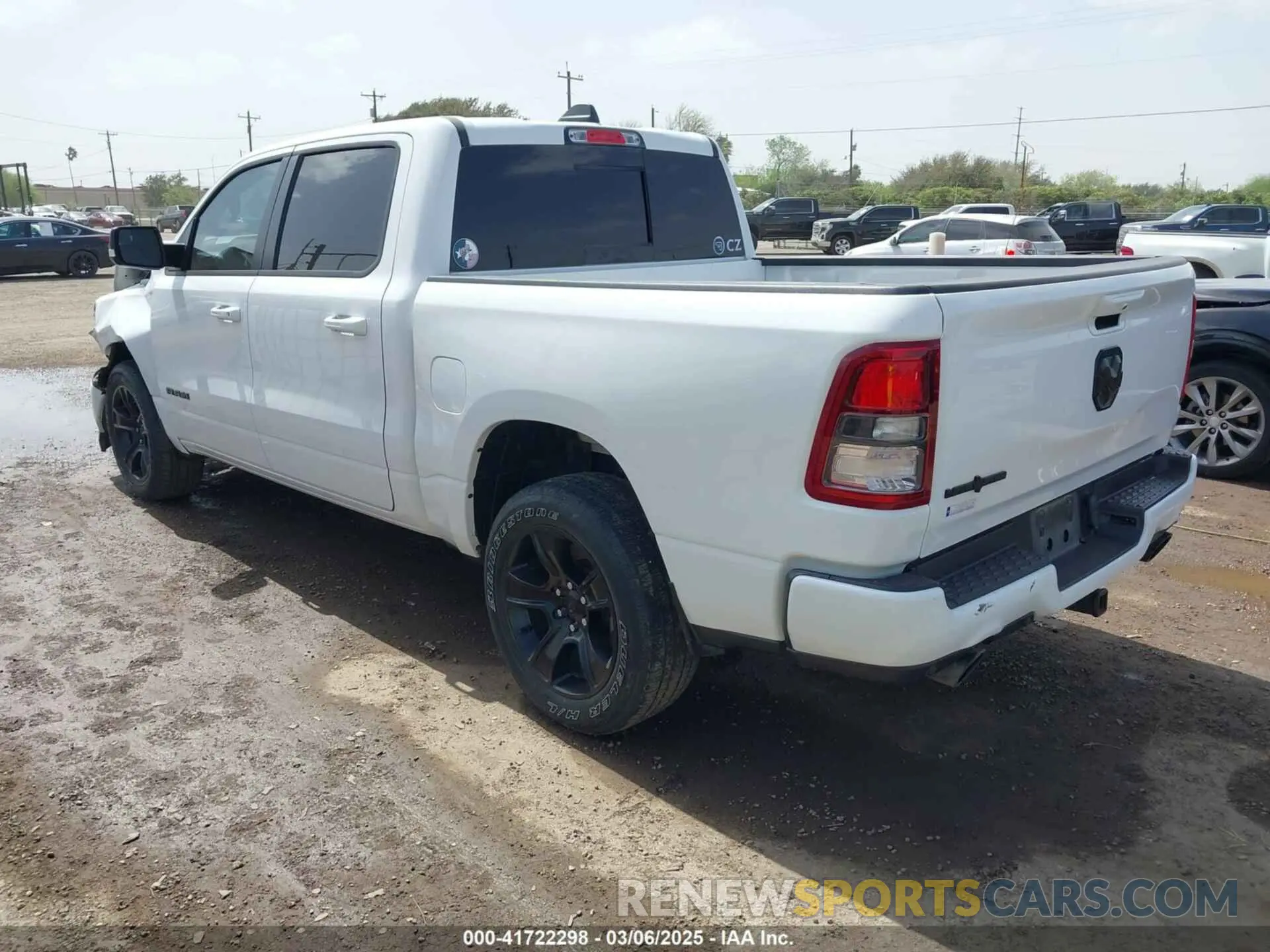 3 Photograph of a damaged car 1C6RREFT1MN592746 RAM 1500 2021