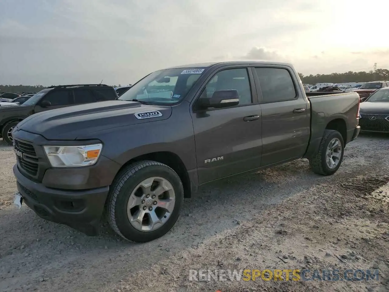 1 Photograph of a damaged car 1C6RREFT1MN630881 RAM 1500 2021