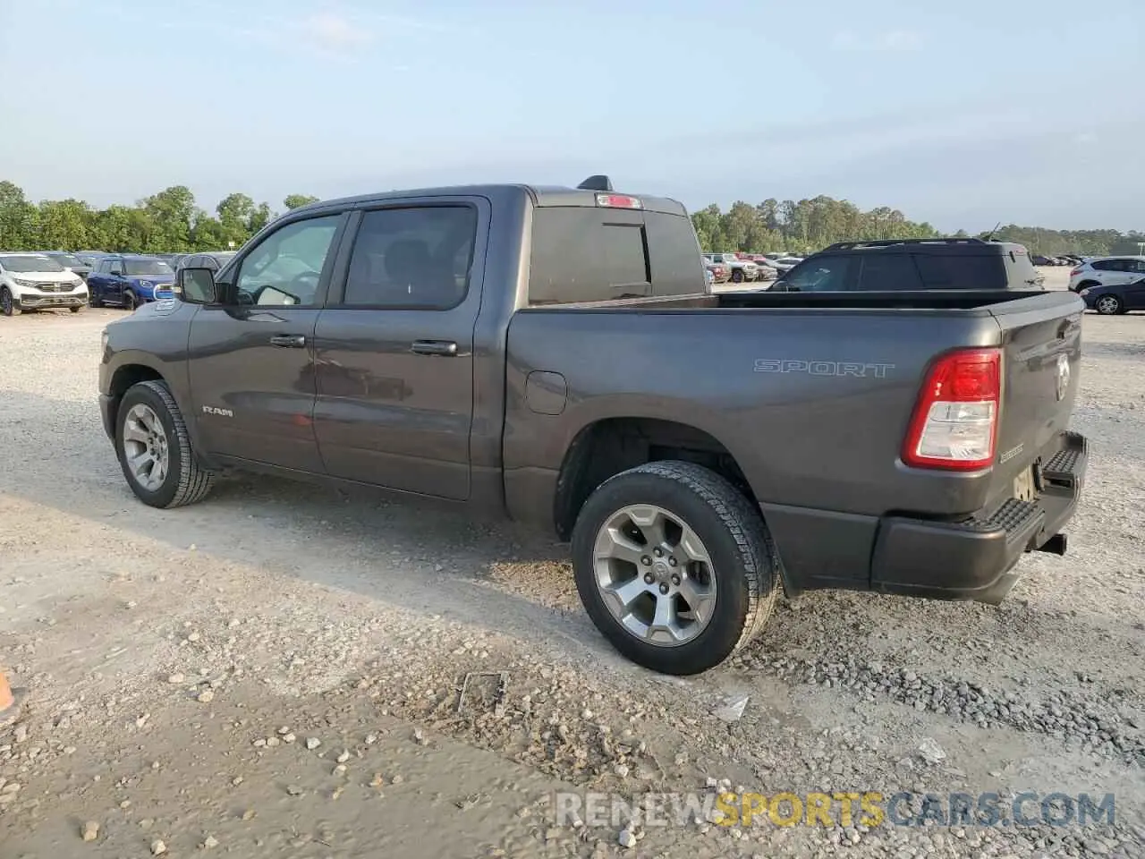 2 Photograph of a damaged car 1C6RREFT1MN630881 RAM 1500 2021