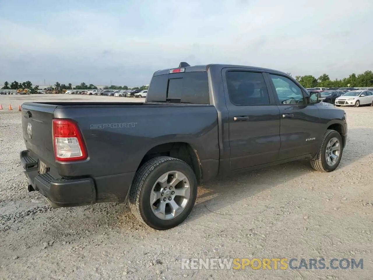 3 Photograph of a damaged car 1C6RREFT1MN630881 RAM 1500 2021
