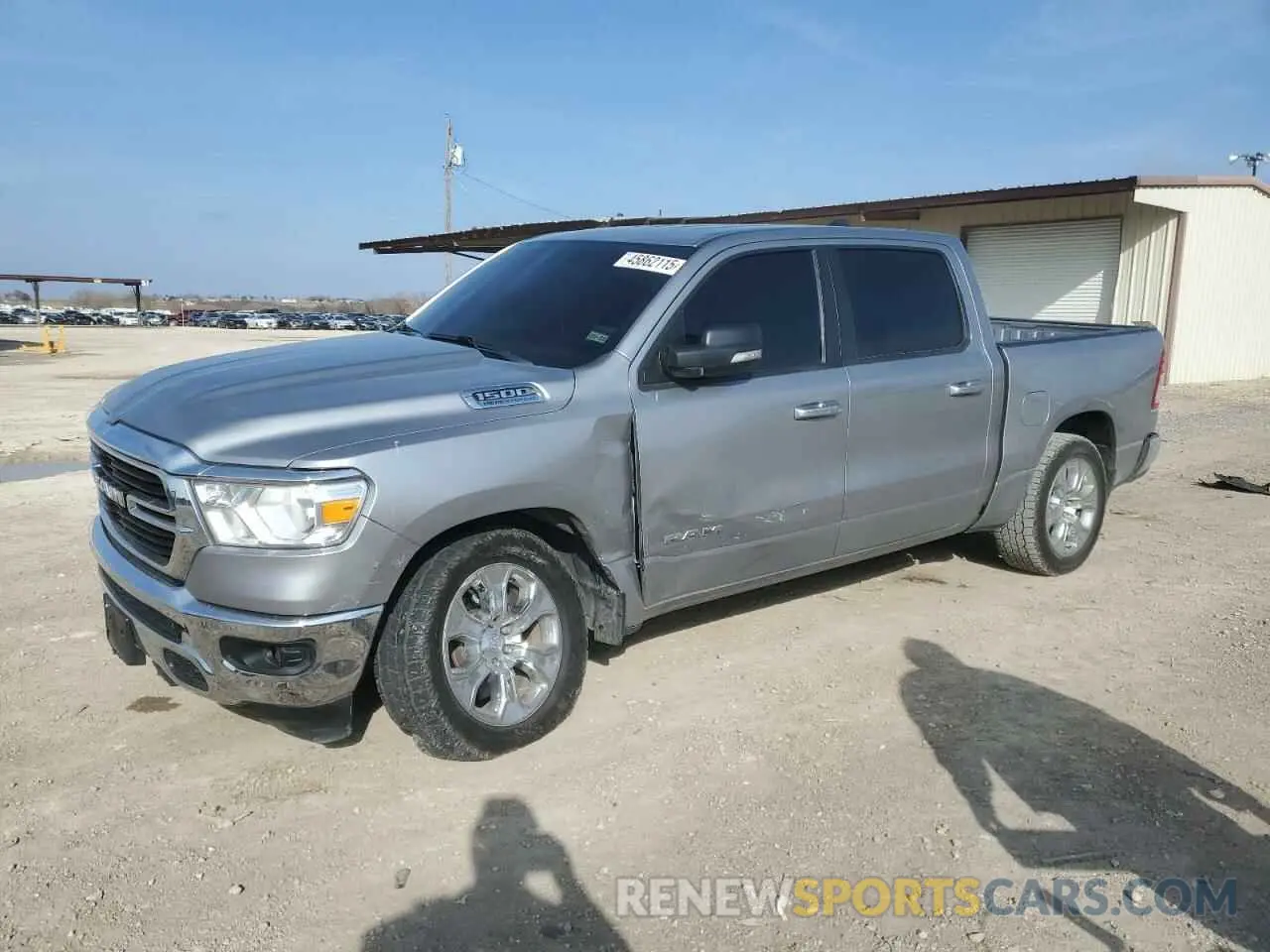 1 Photograph of a damaged car 1C6RREFT1MN647132 RAM 1500 2021