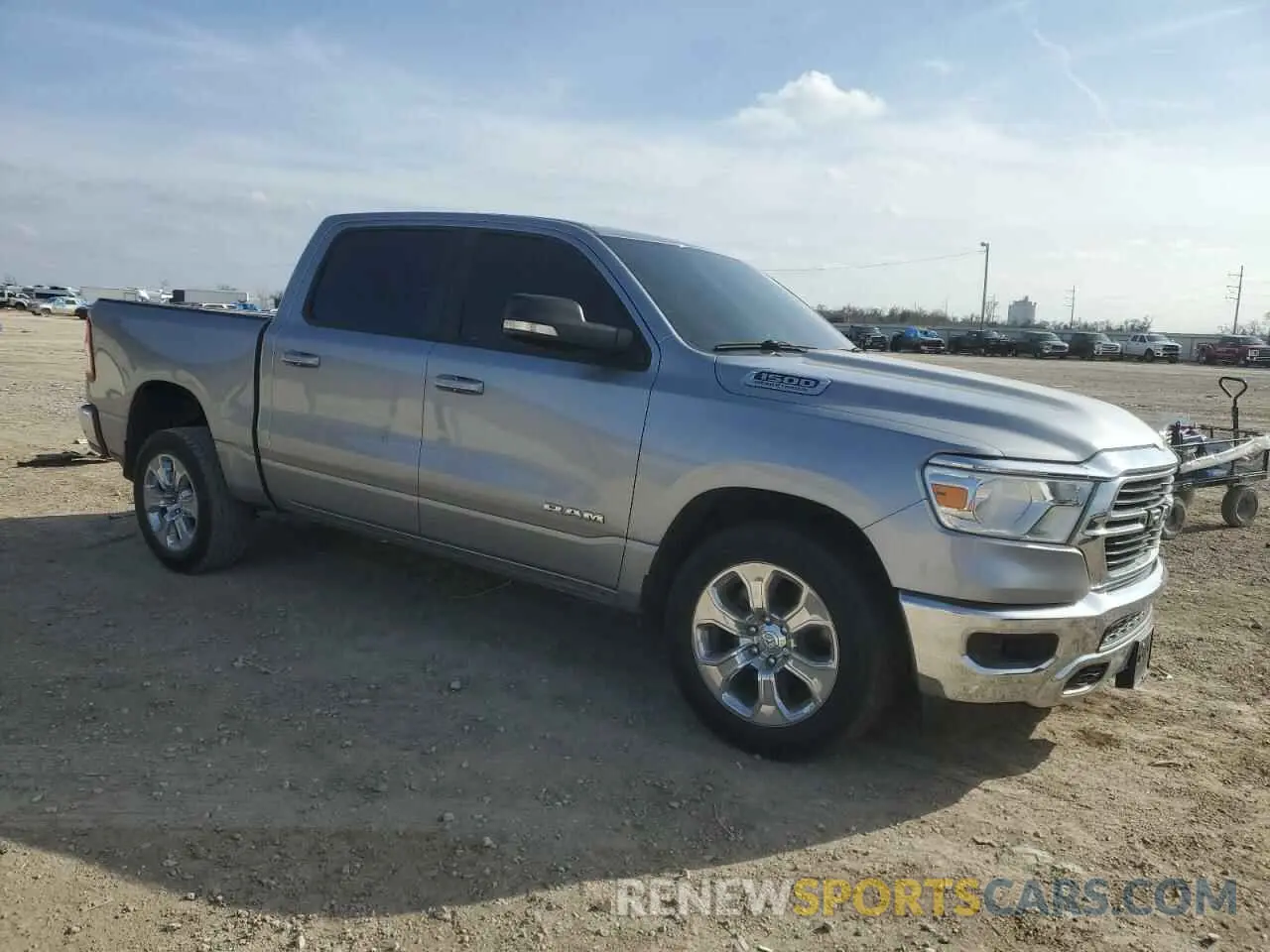4 Photograph of a damaged car 1C6RREFT1MN647132 RAM 1500 2021