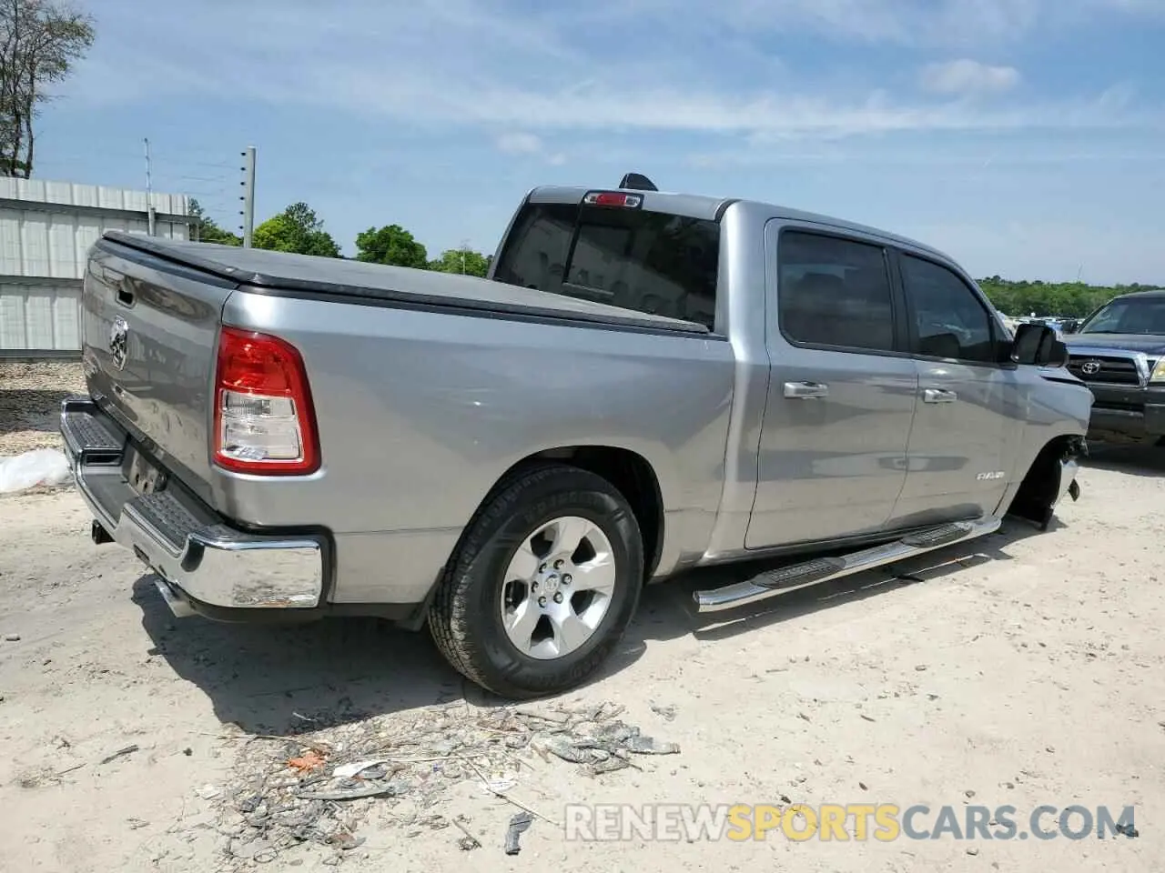 3 Photograph of a damaged car 1C6RREFT1MN660589 RAM 1500 2021