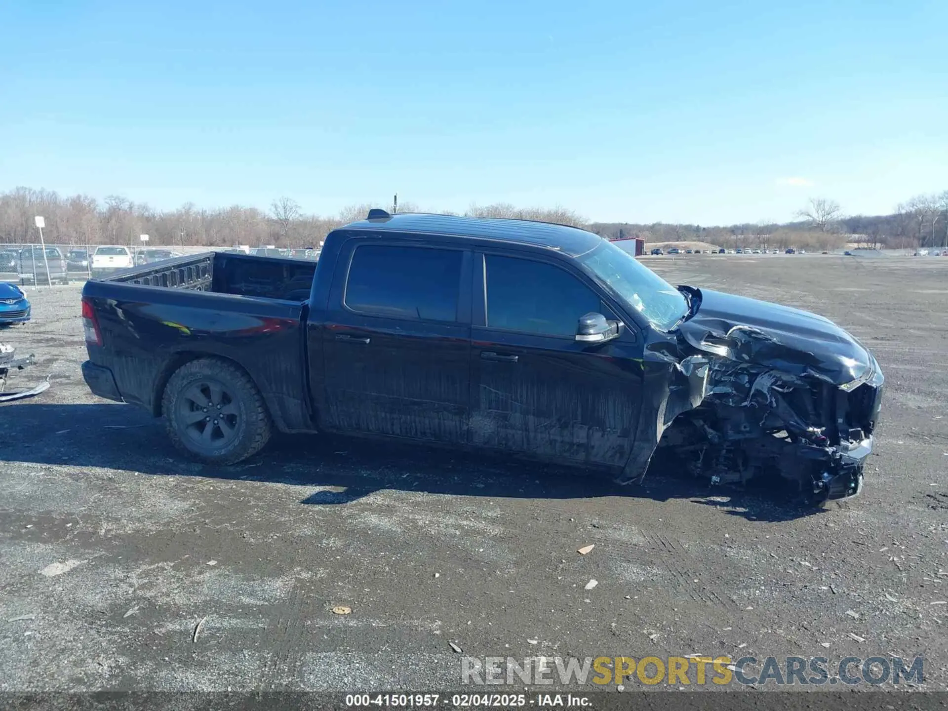 13 Photograph of a damaged car 1C6RREFT1MN690725 RAM 1500 2021