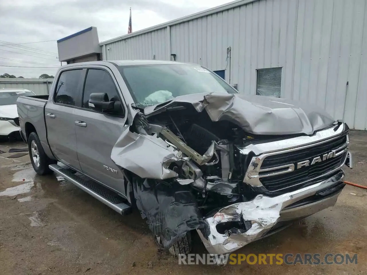 4 Photograph of a damaged car 1C6RREFT1MN801967 RAM 1500 2021