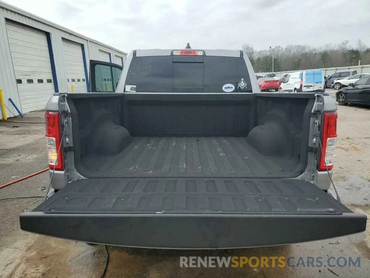6 Photograph of a damaged car 1C6RREFT1MN801967 RAM 1500 2021