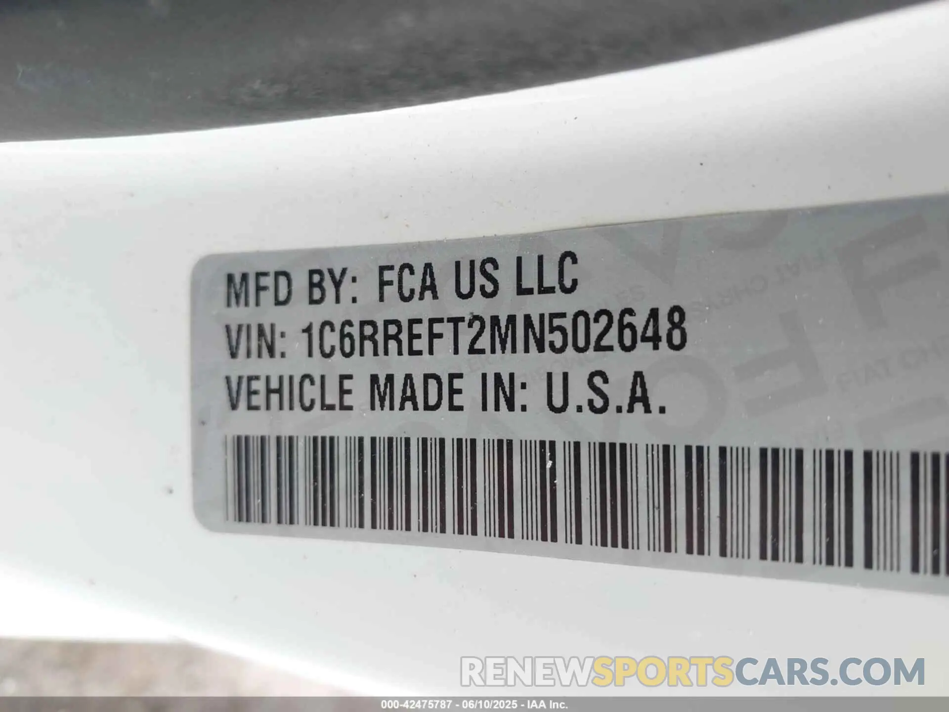 9 Photograph of a damaged car 1C6RREFT2MN502648 RAM 1500 2021