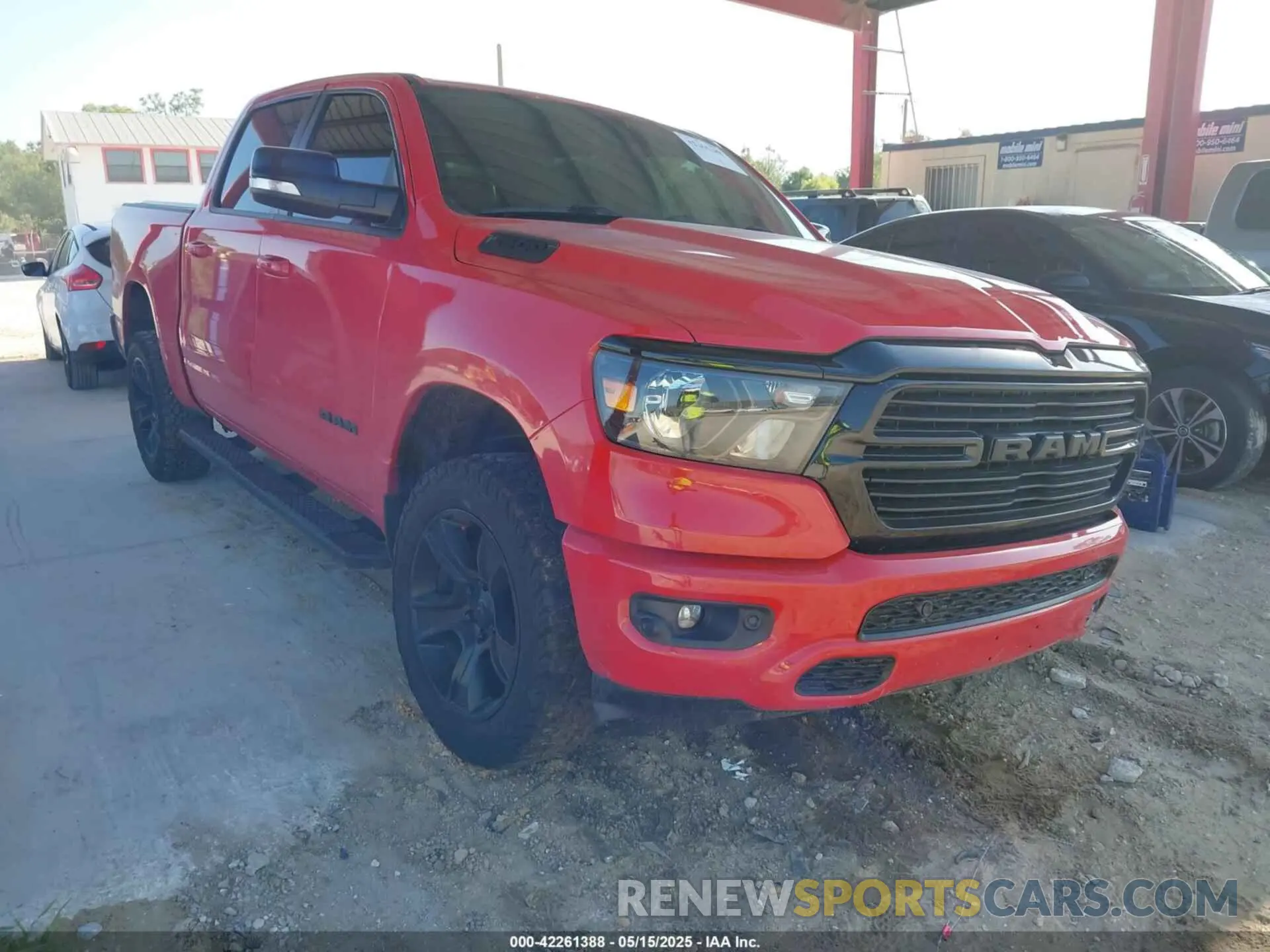 1 Photograph of a damaged car 1C6RREFT2MN574093 RAM 1500 2021