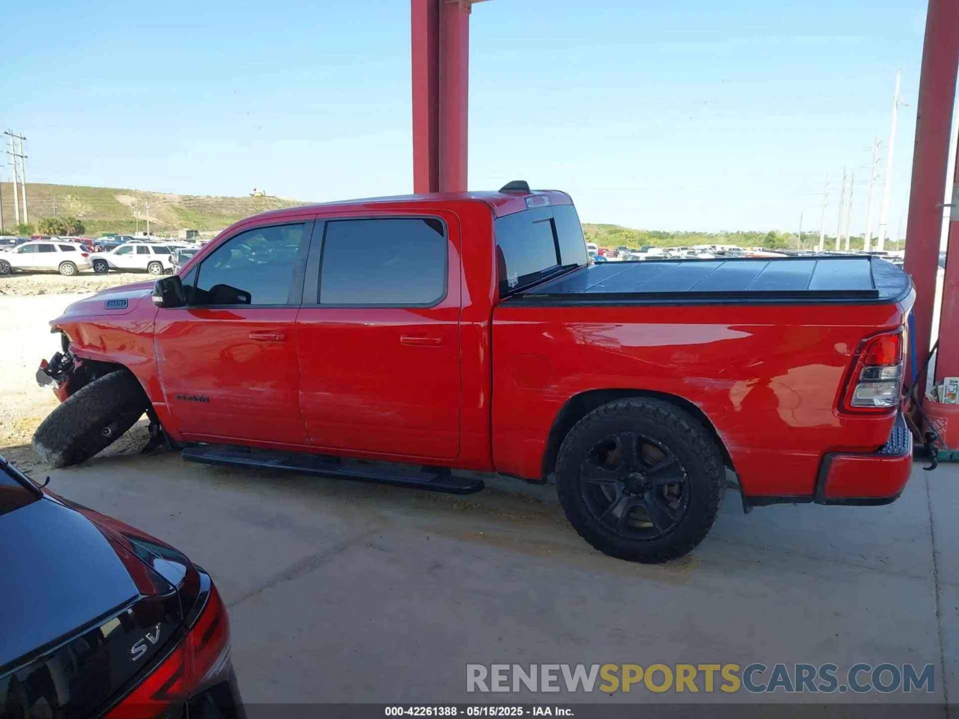 14 Photograph of a damaged car 1C6RREFT2MN574093 RAM 1500 2021
