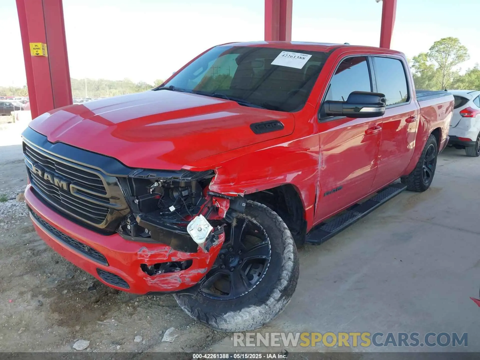 2 Photograph of a damaged car 1C6RREFT2MN574093 RAM 1500 2021