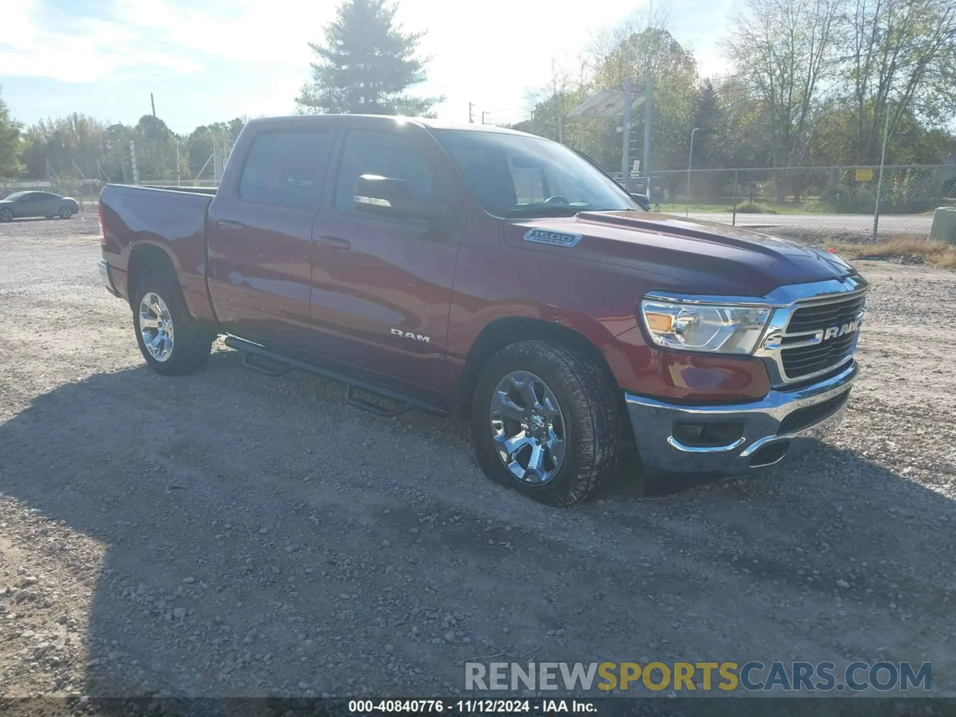 1 Photograph of a damaged car 1C6RREFT2MN609098 RAM 1500 2021