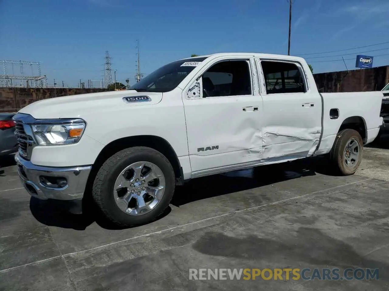 1 Photograph of a damaged car 1C6RREFT2MN747109 RAM 1500 2021