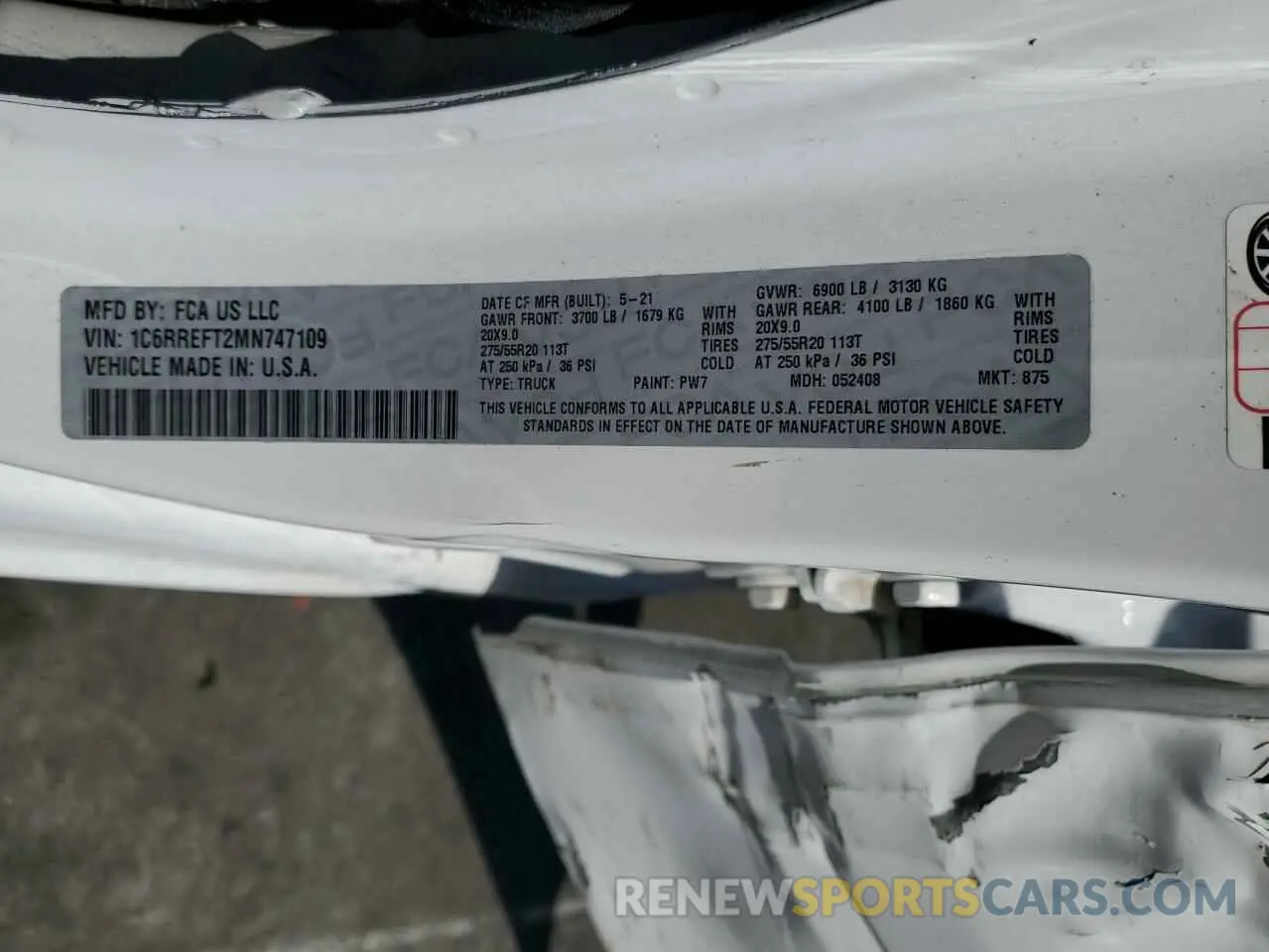 13 Photograph of a damaged car 1C6RREFT2MN747109 RAM 1500 2021