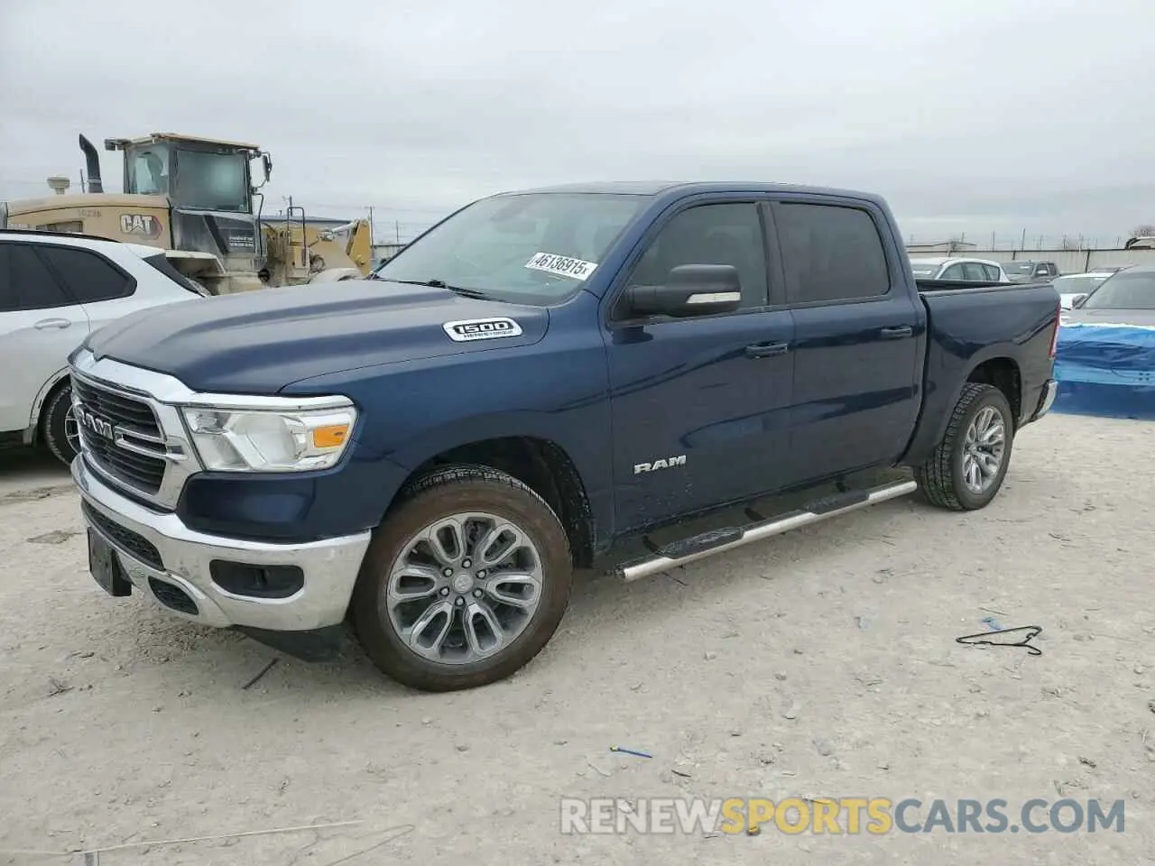 1 Photograph of a damaged car 1C6RREFT3MN631465 RAM 1500 2021