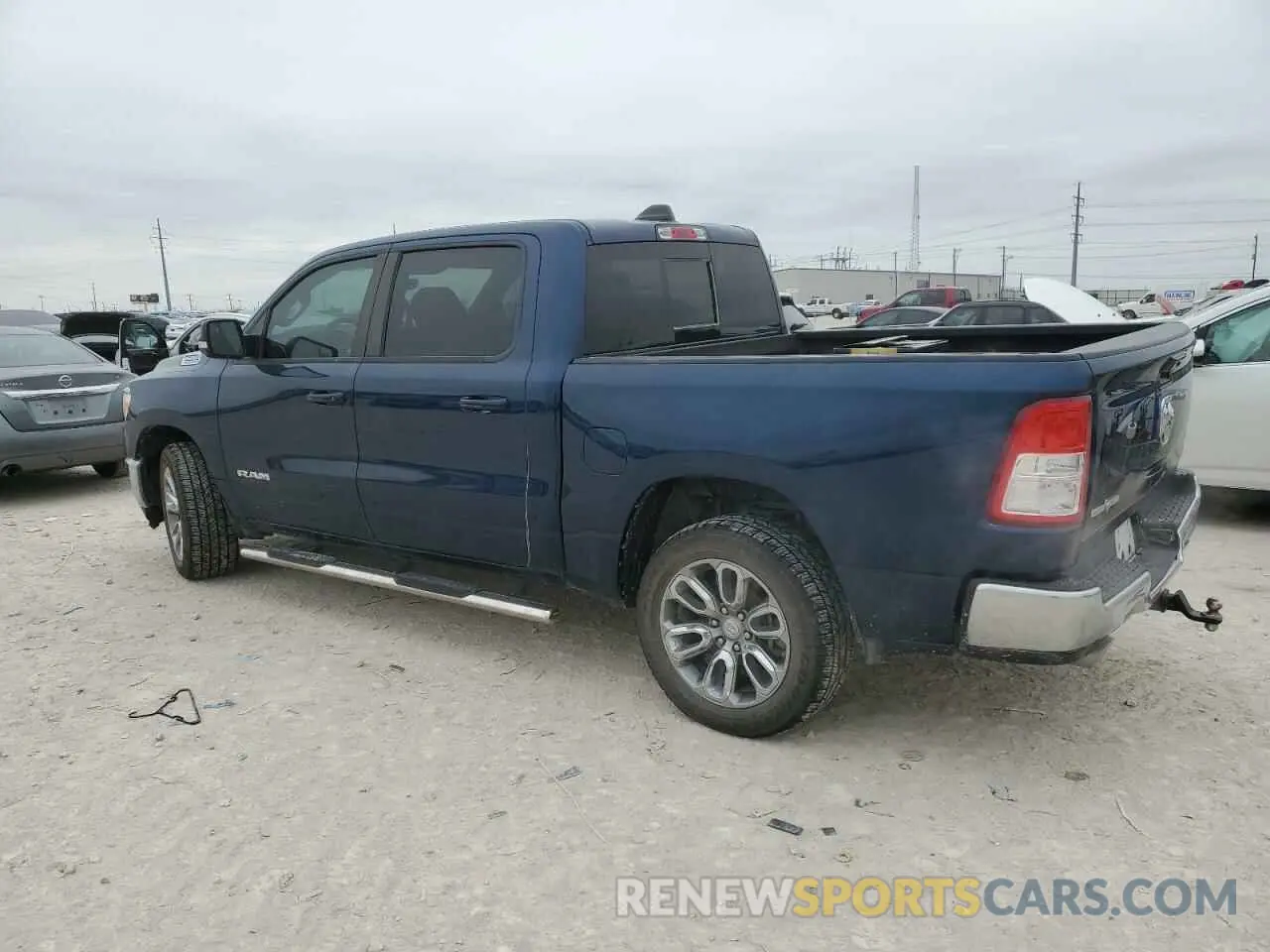 2 Photograph of a damaged car 1C6RREFT3MN631465 RAM 1500 2021