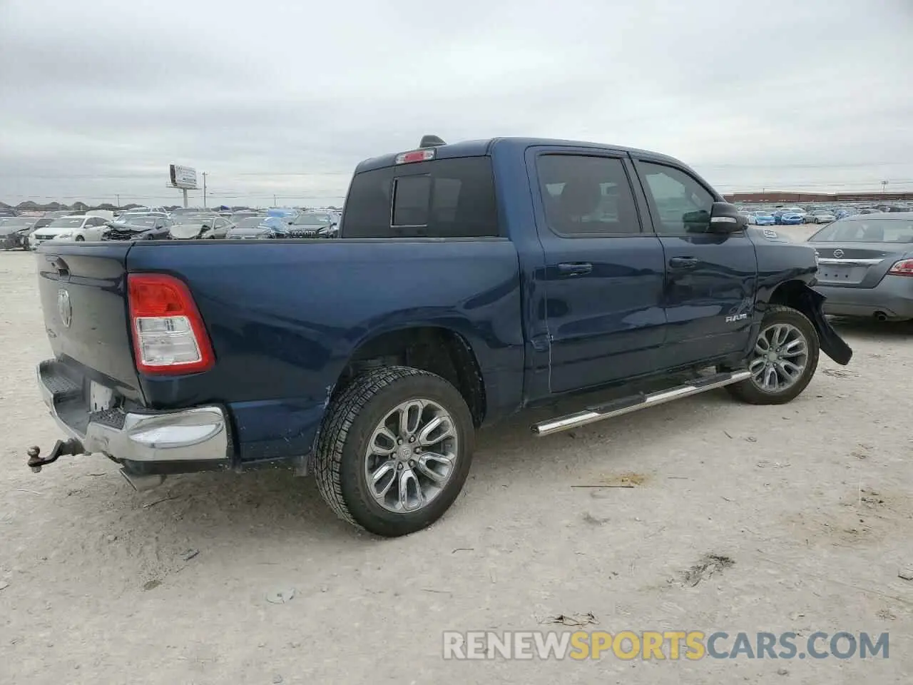 3 Photograph of a damaged car 1C6RREFT3MN631465 RAM 1500 2021