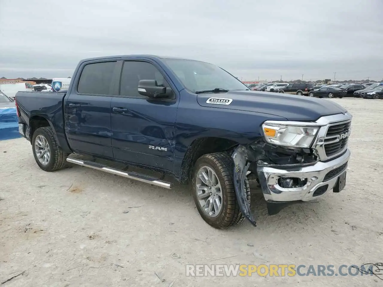 4 Photograph of a damaged car 1C6RREFT3MN631465 RAM 1500 2021