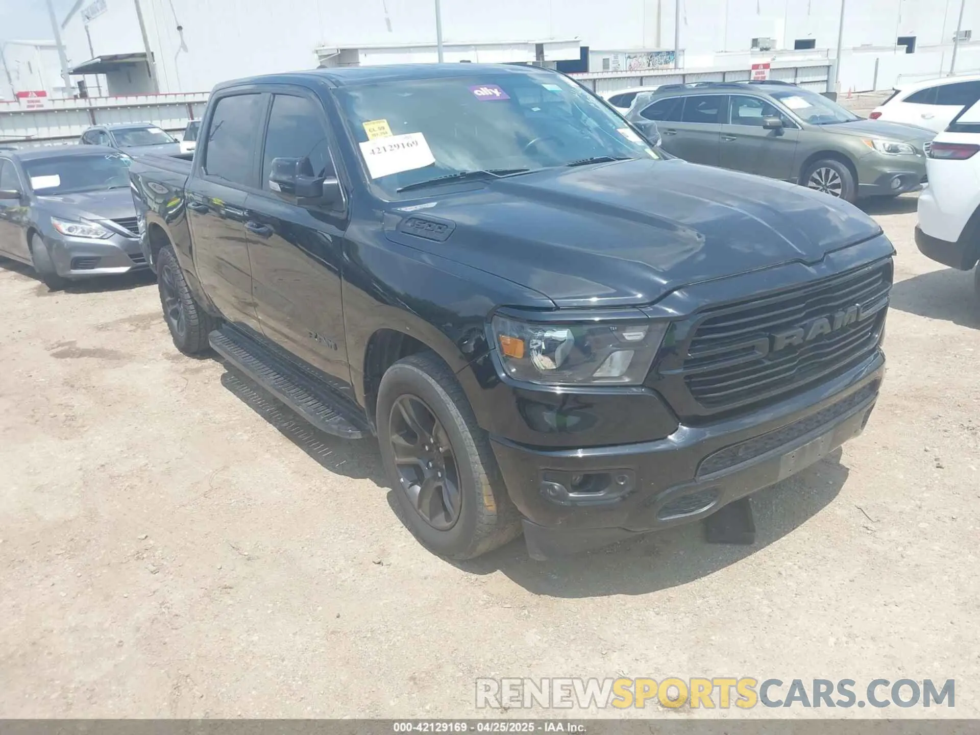 1 Photograph of a damaged car 1C6RREFT3MN647245 RAM 1500 2021