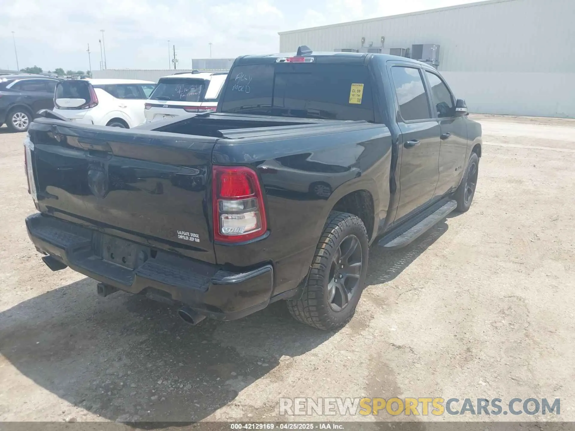 4 Photograph of a damaged car 1C6RREFT3MN647245 RAM 1500 2021